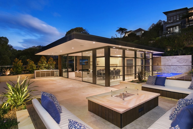 With the look of an elegant Japanese teahouse estate, home, house, property, real estate, resort, swimming pool, villa, blue
