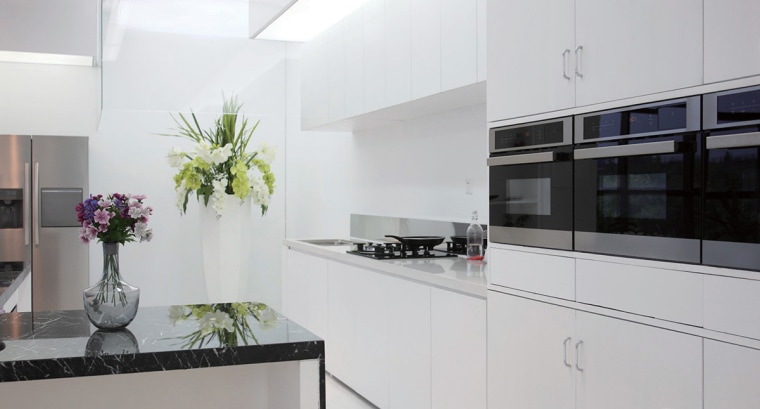 Clever and good looking – a bank of countertop, interior design, kitchen, property, real estate, gray