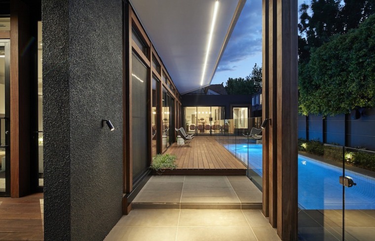 A light strip serves as both an interesting architecture, condominium, estate, home, house, interior design, lighting, property, real estate, window, black