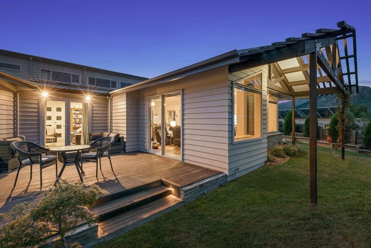 Sit out on the deck and take in backyard, cottage, estate, facade, home, house, property, real estate, residential area, siding, brown