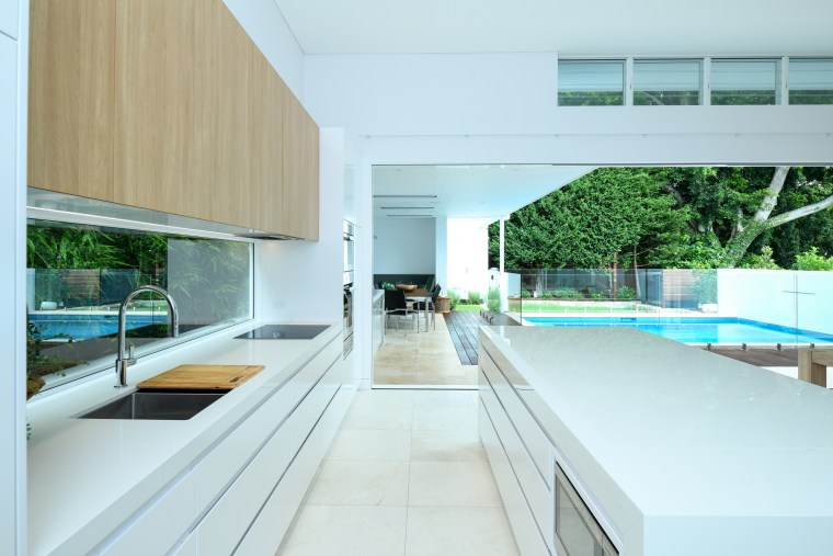 Indoor-outdoor flow has never looked this good – apartment, architecture, building, ceiling, daylighting, design, floor, furniture, home, house, interior design, property, real estate, room, window, white