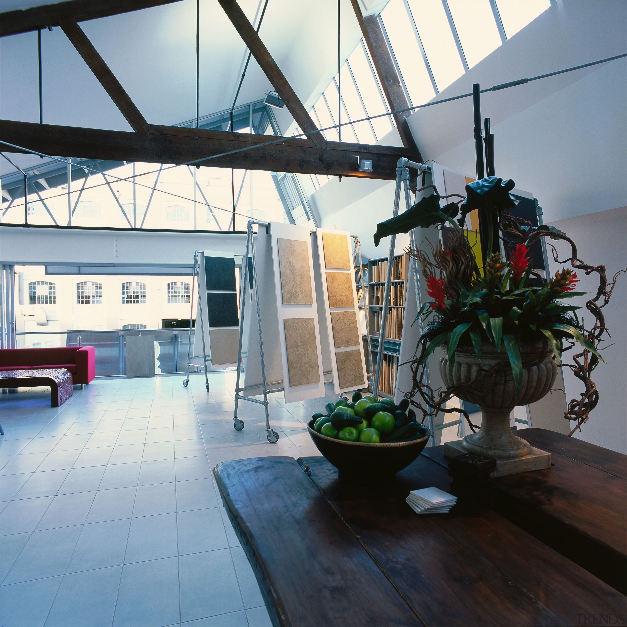 a bowl of fruit and a large vase architecture, daylighting, house, interior design, loft, roof, black, gray