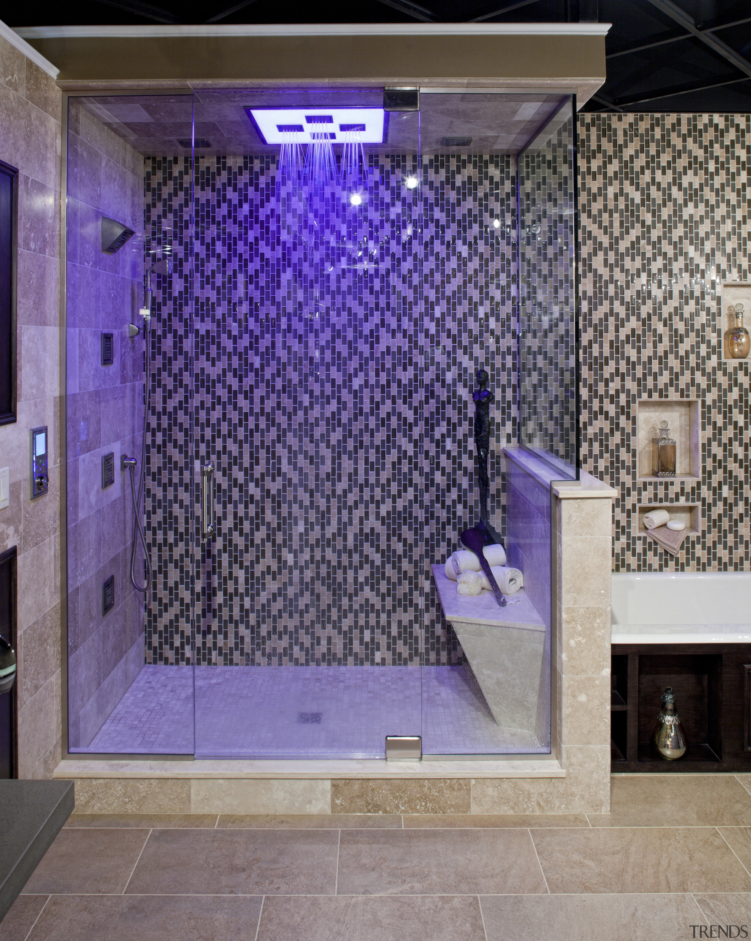 View of a bathroom which features a glass ceiling, floor, flooring, glass, interior design, purple, tile, wall, purple, gray