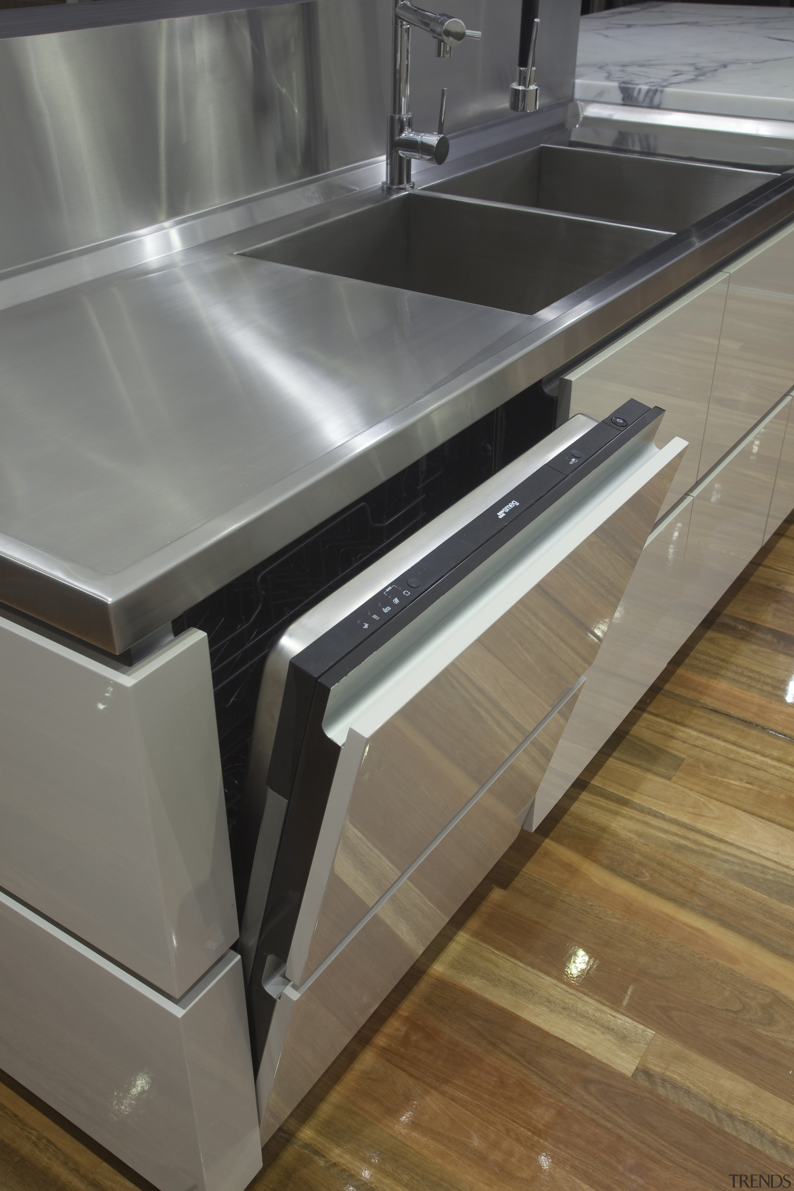 View of kitchen with integrated Smeg ST663 dishwashers. countertop, furniture, kitchen, sink, table, gray, brown