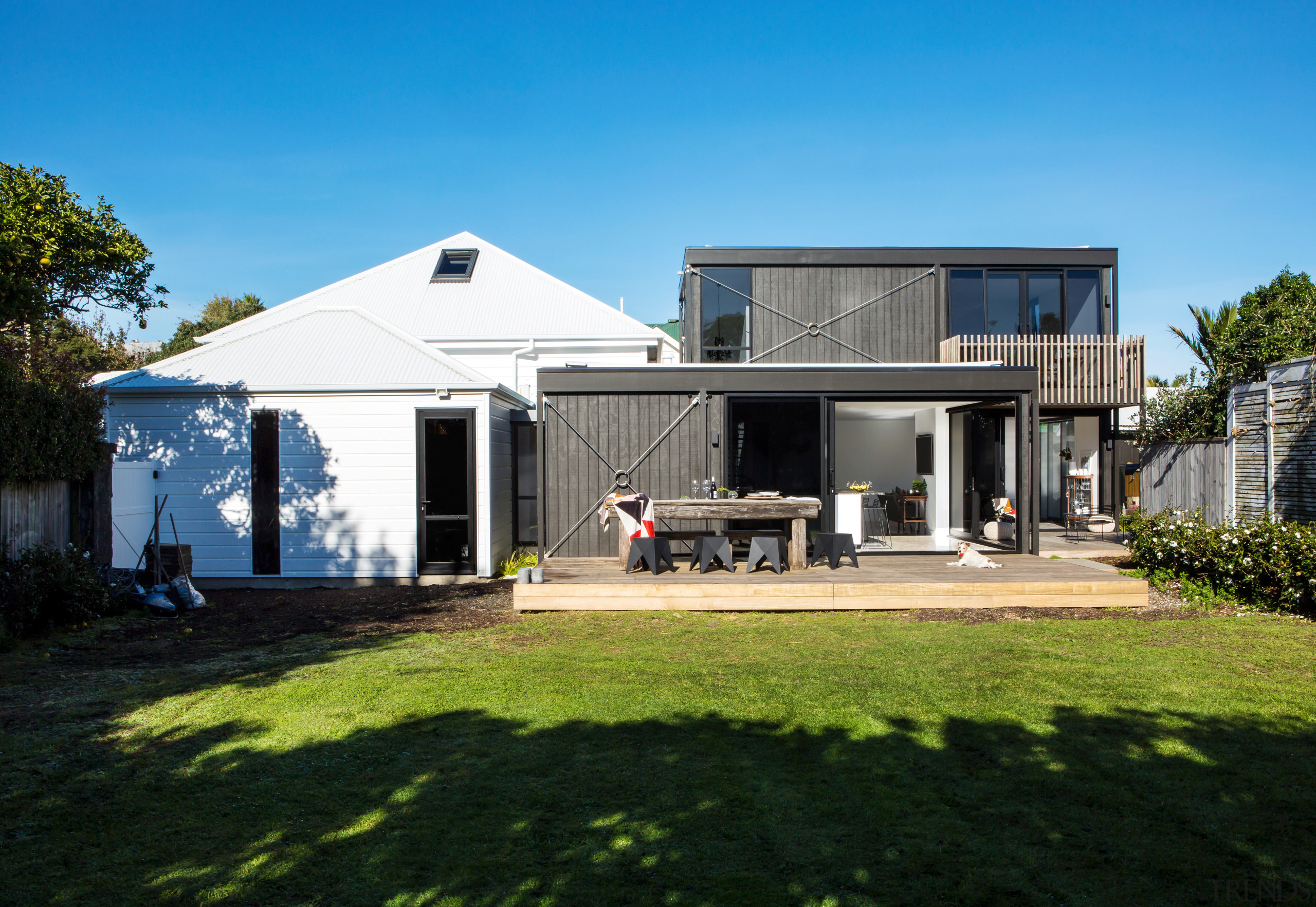 An historic cottage at the front gives way architecture, facade, home, house, property, real estate, teal, black