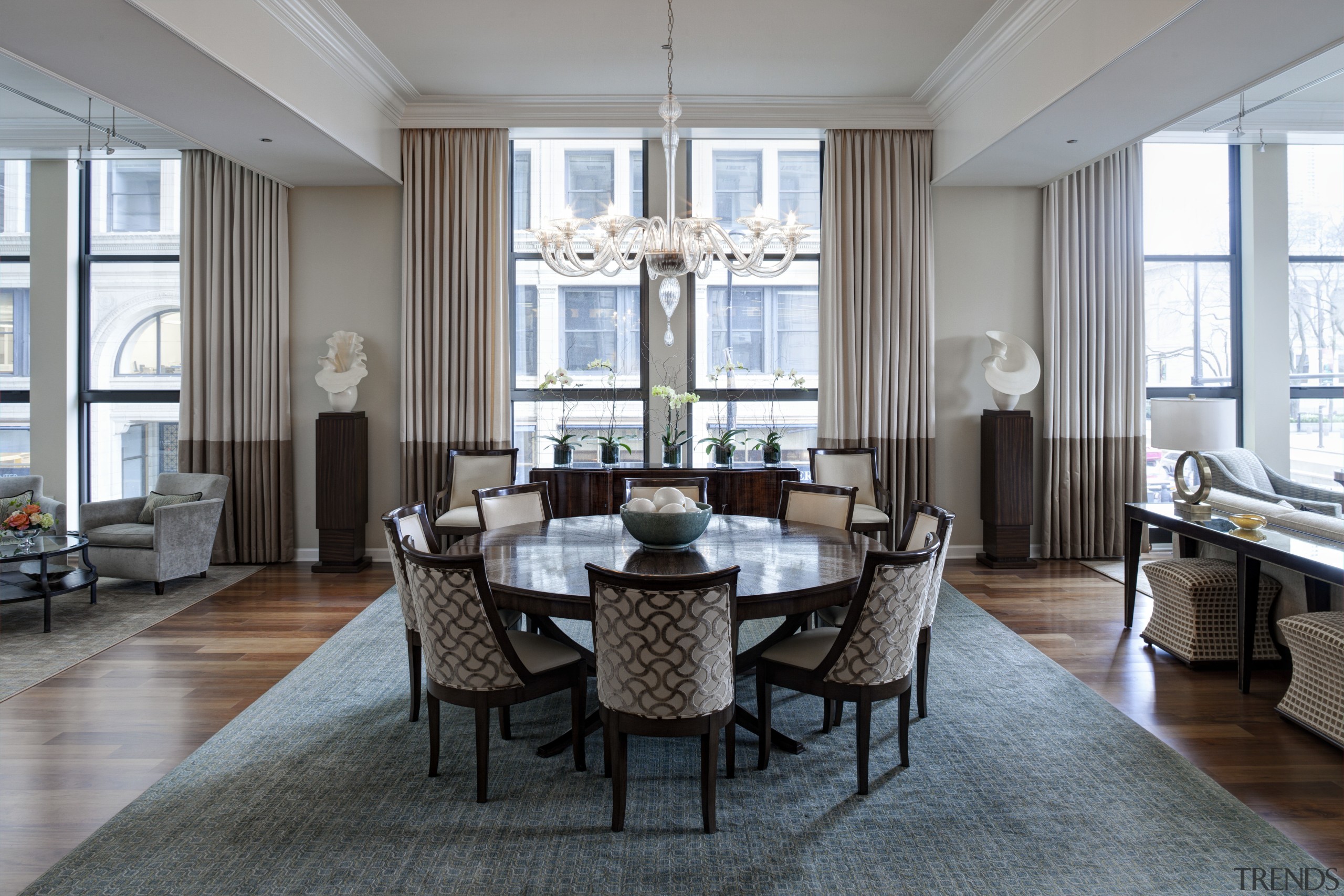 Accents of blue-green enliven this remodeled apartment interior, ceiling, chair, dining room, flooring, furniture, home, interior design, living room, real estate, room, table, window, gray