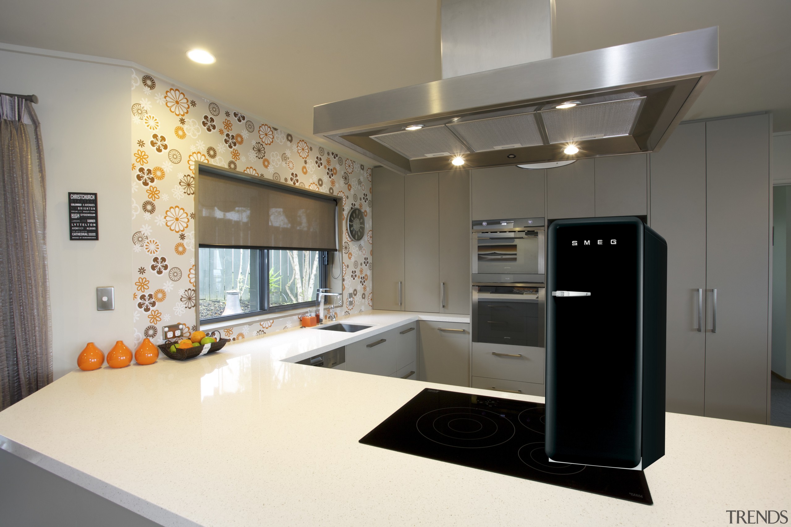 This new kitchen designed by Colleen Holder features countertop, home appliance, interior design, kitchen, gray, white