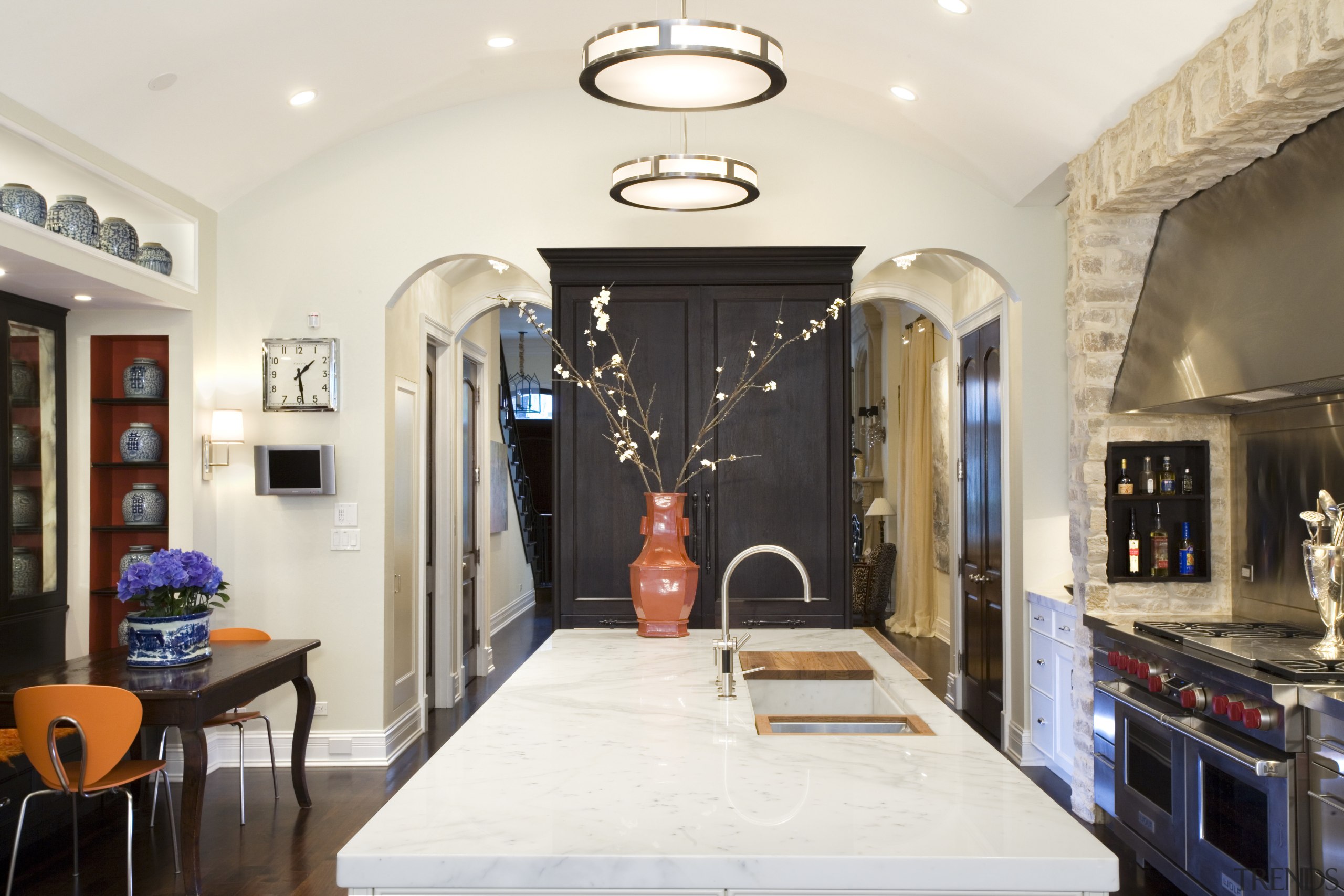 View of kitchen featuring wooden floor, cabinetry, marble ceiling, countertop, estate, home, interior design, kitchen, living room, real estate, room, white