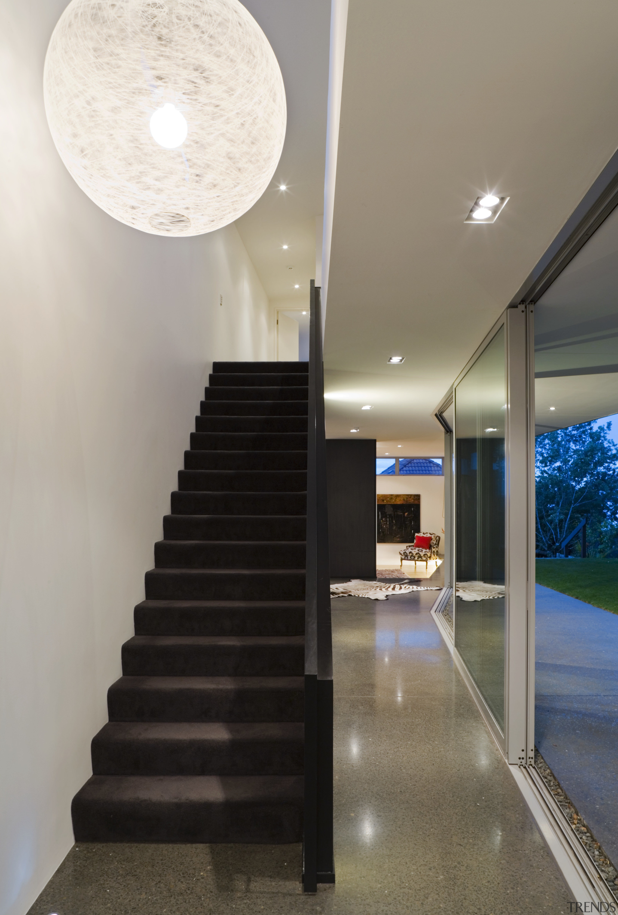 A vista from the entrance to the southern architecture, ceiling, daylighting, floor, handrail, home, house, interior design, lighting, stairs, gray