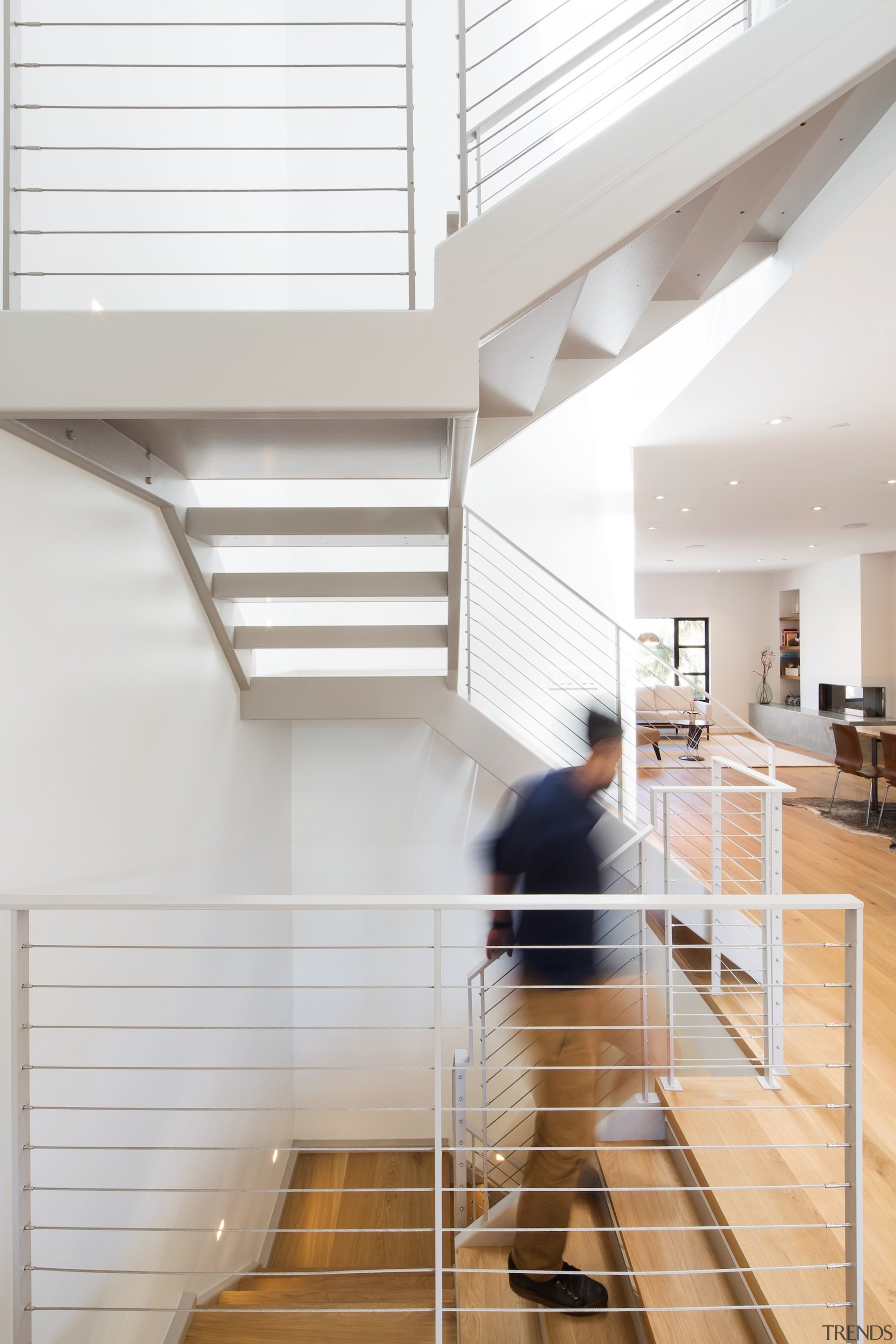 The stairway is large, but not intrusive - apartment, architecture, daylighting, floor, flooring, handrail, hardwood, home, house, interior design, line, product design, stairs, wood, white