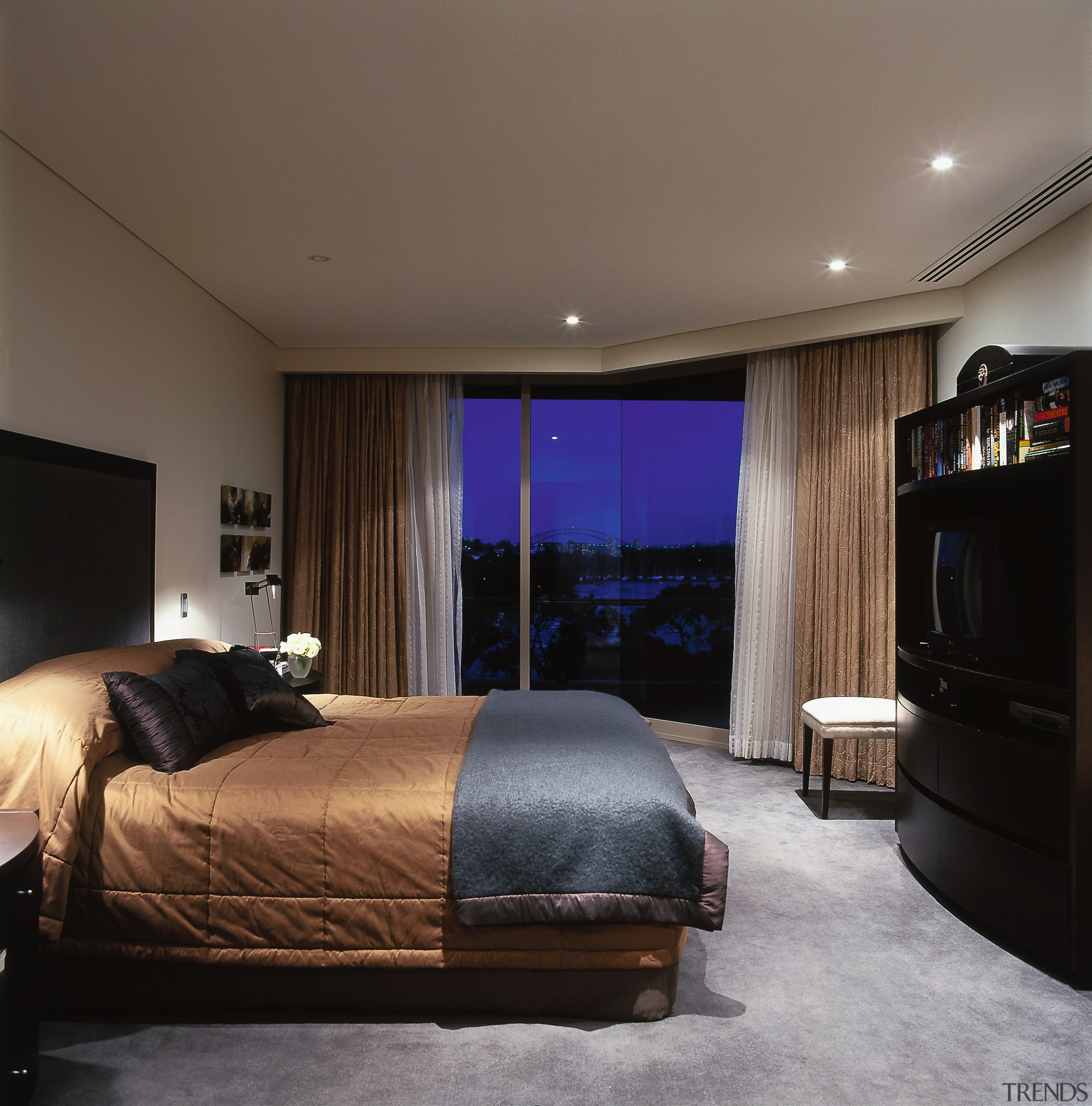 A view of the masterbedroom that has a bed frame, bedroom, ceiling, interior design, lighting, room, wall, gray, black