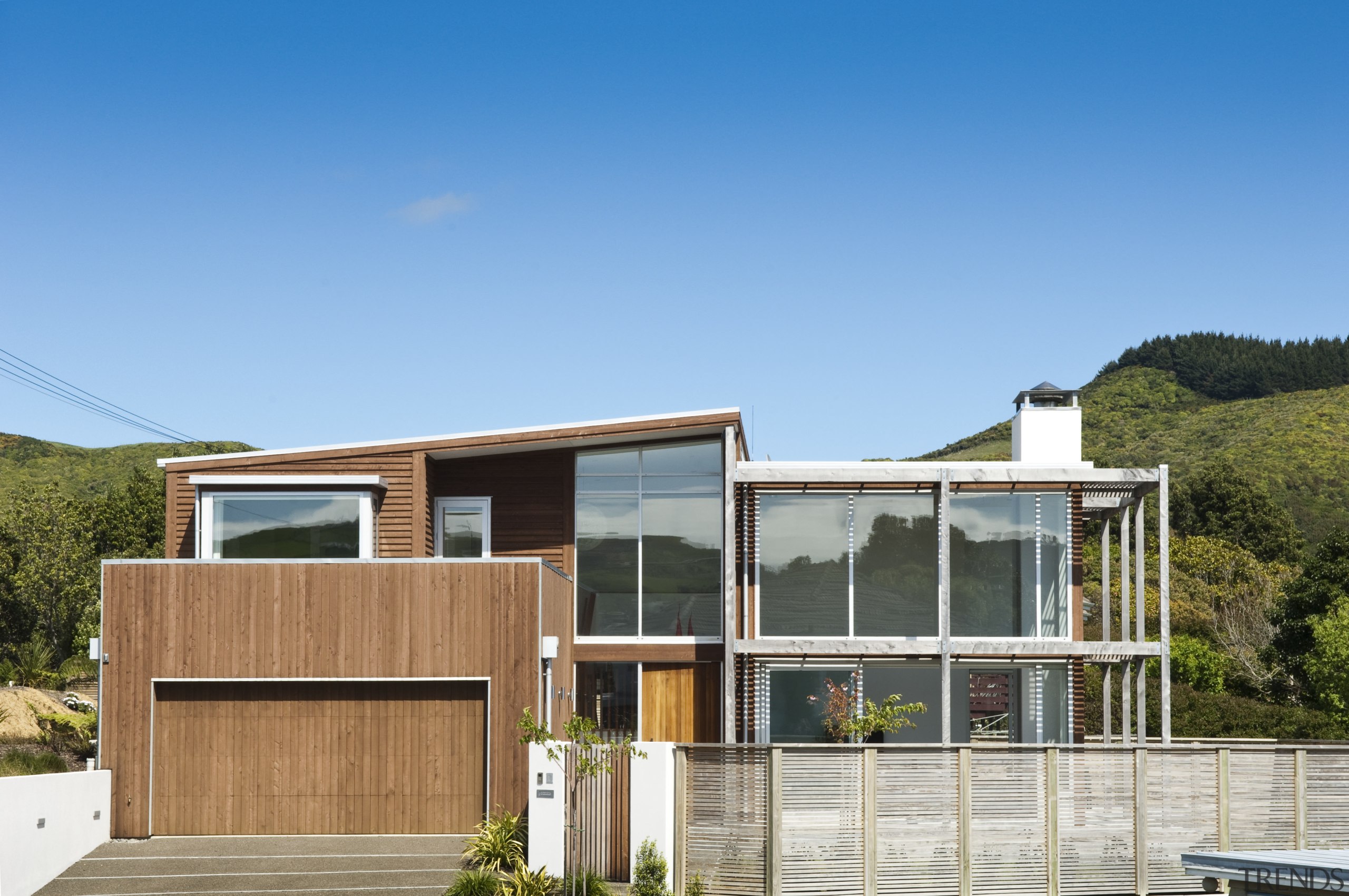 Exterior view of contemporary home. - Exterior view architecture, cottage, elevation, facade, home, house, property, real estate, residential area, teal