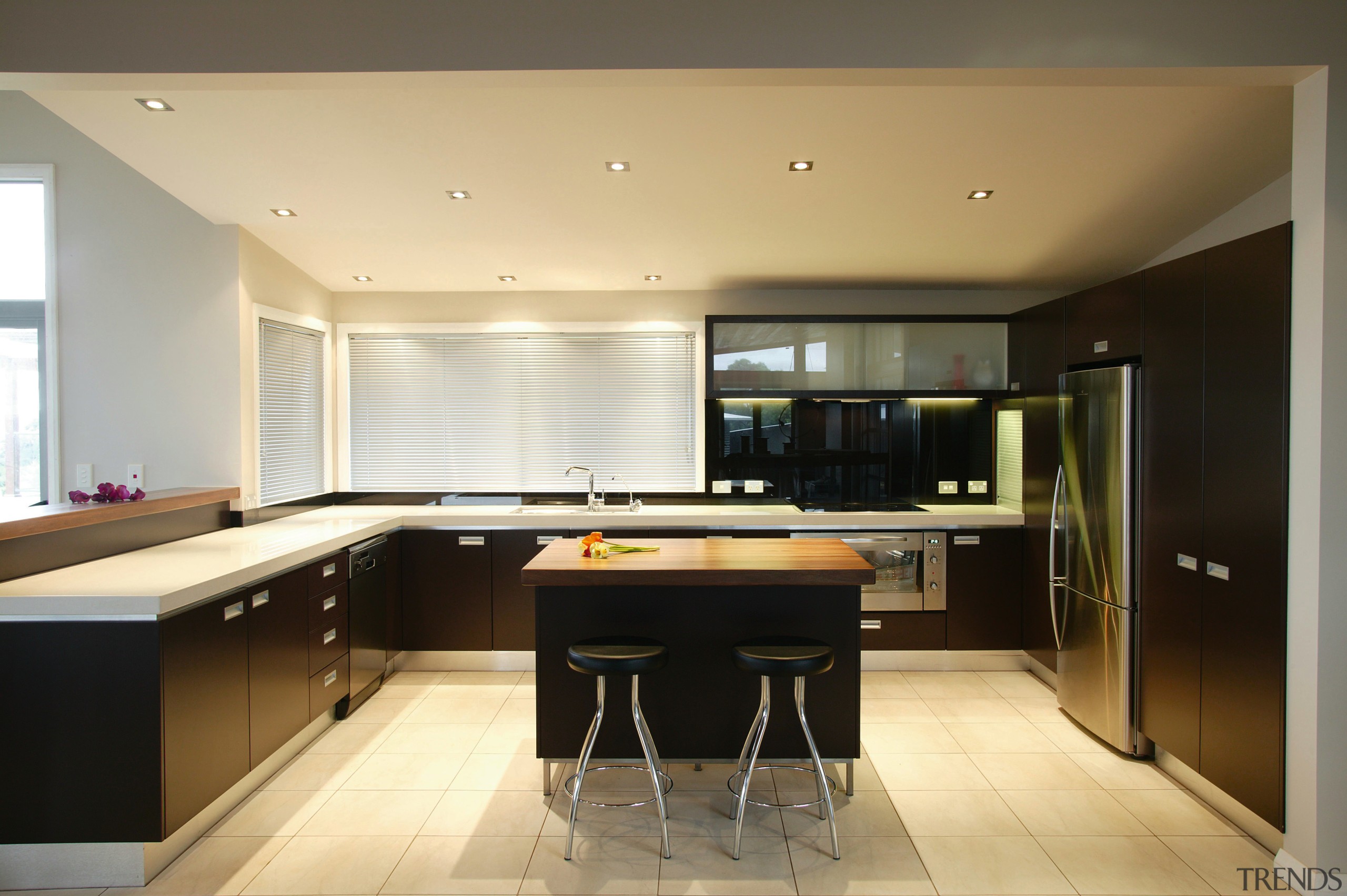 Kitchen with dark brown cabinetry, white benchtops, timber architecture, cabinetry, countertop, cuisine classique, floor, house, interior design, kitchen, real estate, room, orange