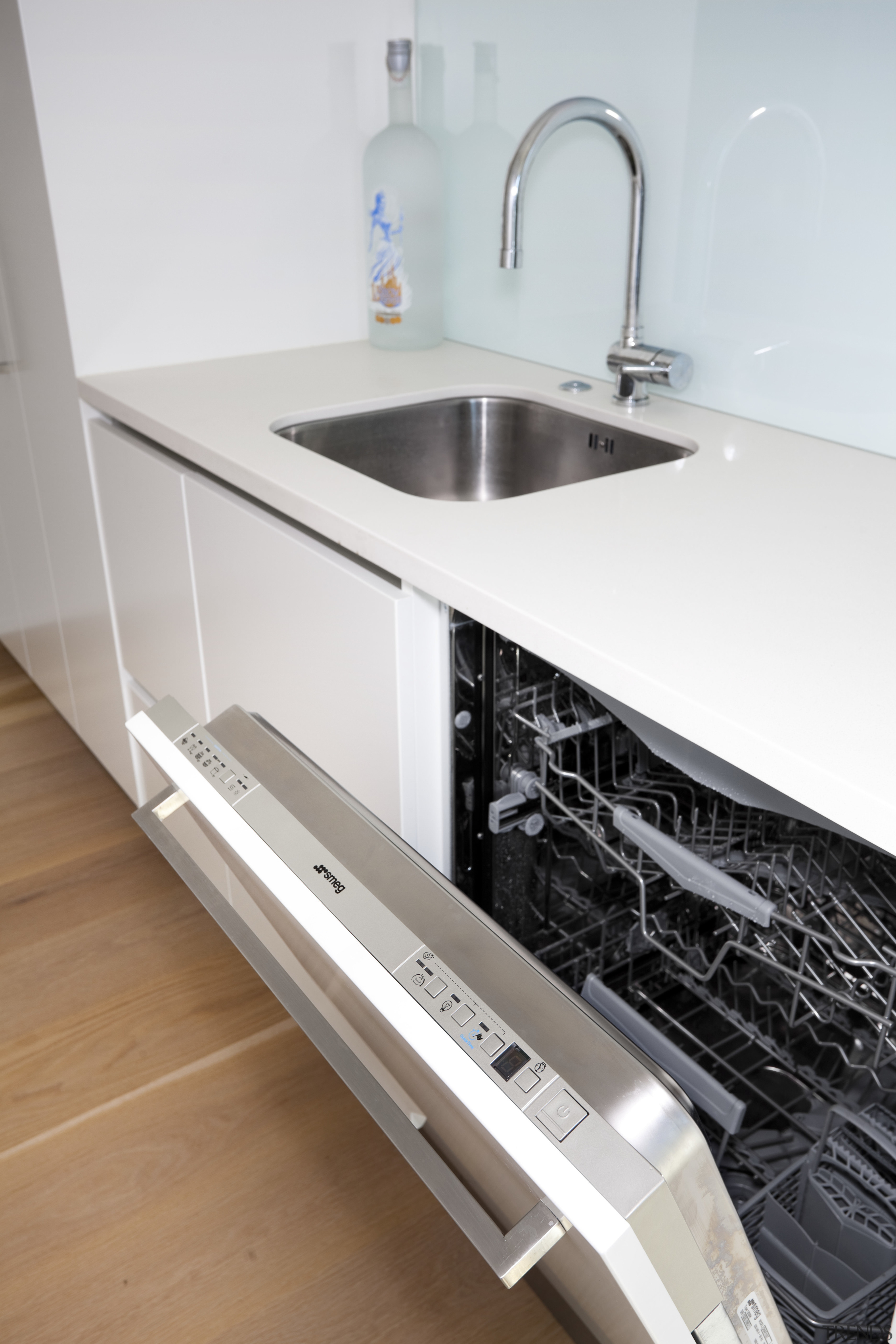 White benchtop with open dishwasher. - White benchtop countertop, home appliance, kitchen, product design, sink, tap, white