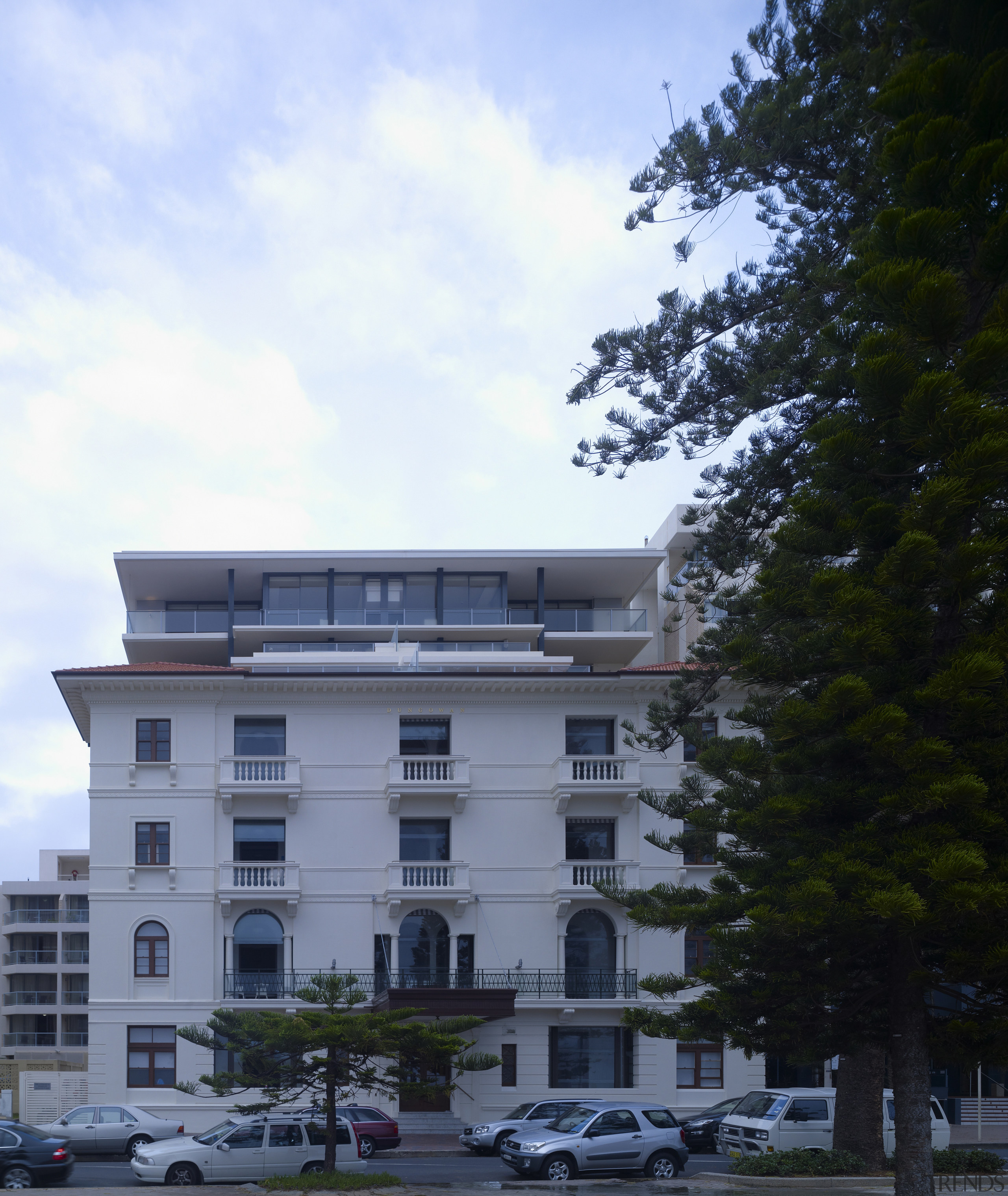 Exterior view of restored historic apartment building. apartment, architecture, building, condominium, corporate headquarters, daytime, estate, facade, home, house, mixed use, property, real estate, residential area, sky, black