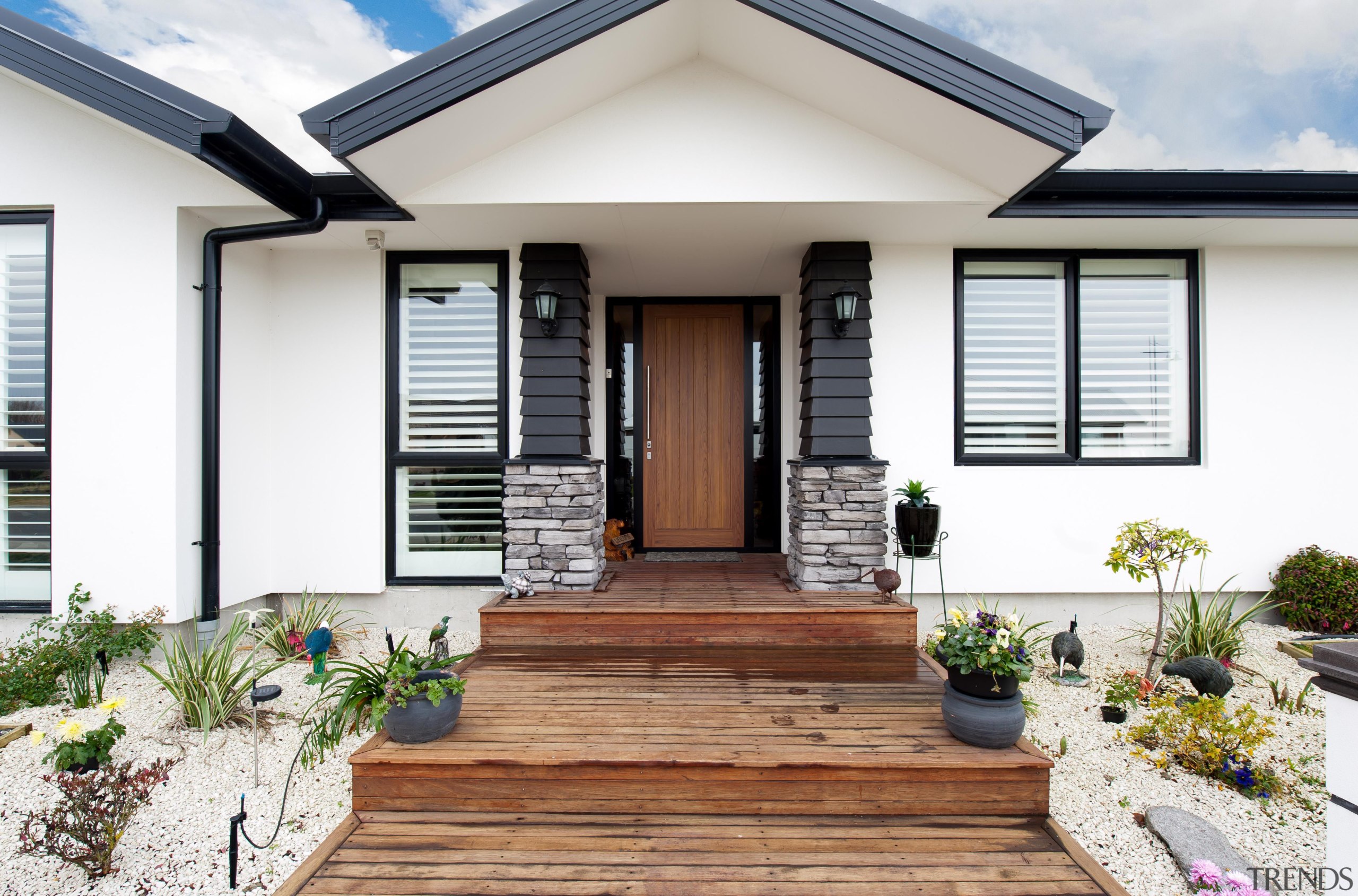 Crisp detailing with Linea weatherboard and schist stone door, estate, facade, home, house, porch, property, real estate, residential area, siding, window, white