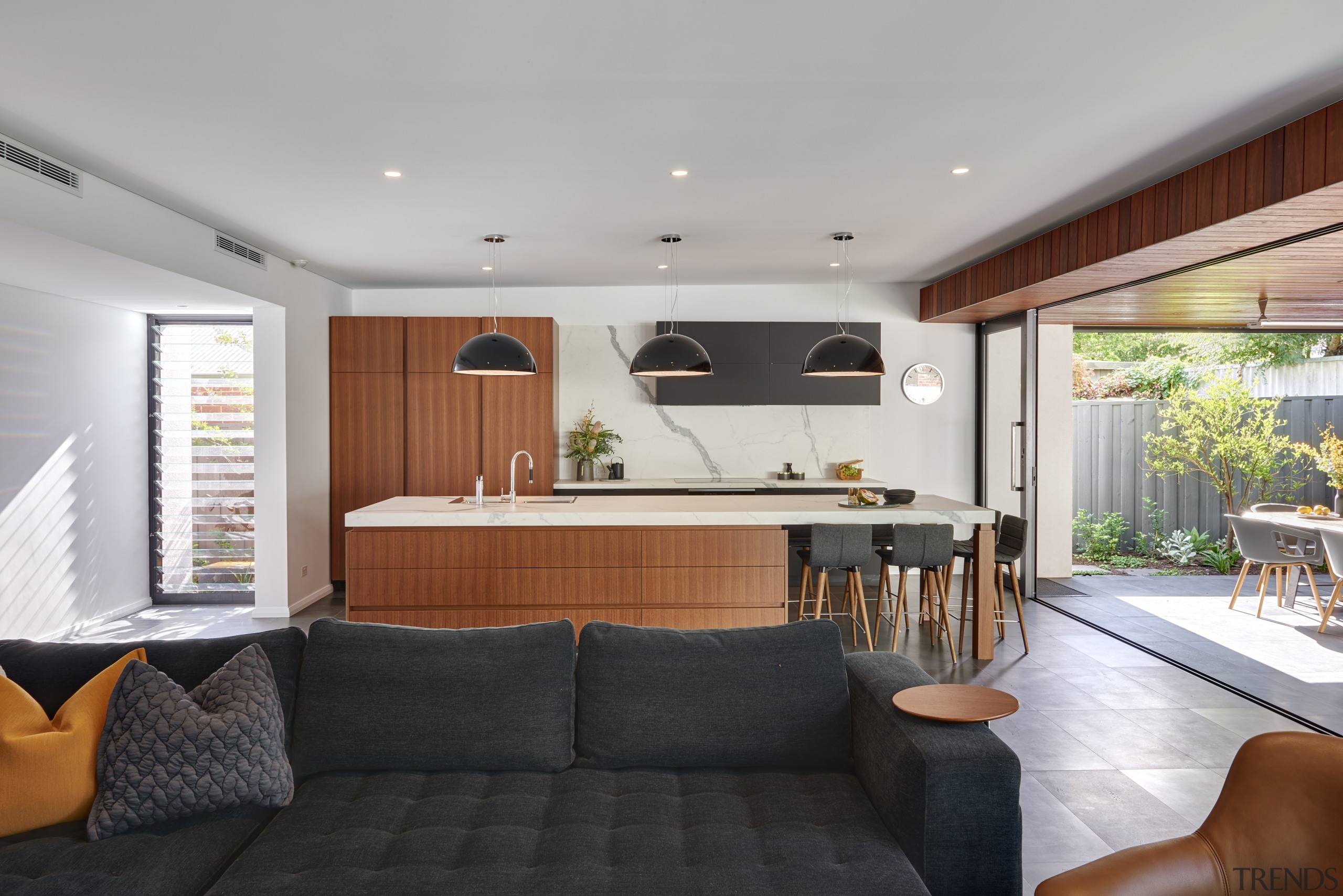 Breathing space between cabinetry elements helps avoid this interior design, living room, real estate, gray