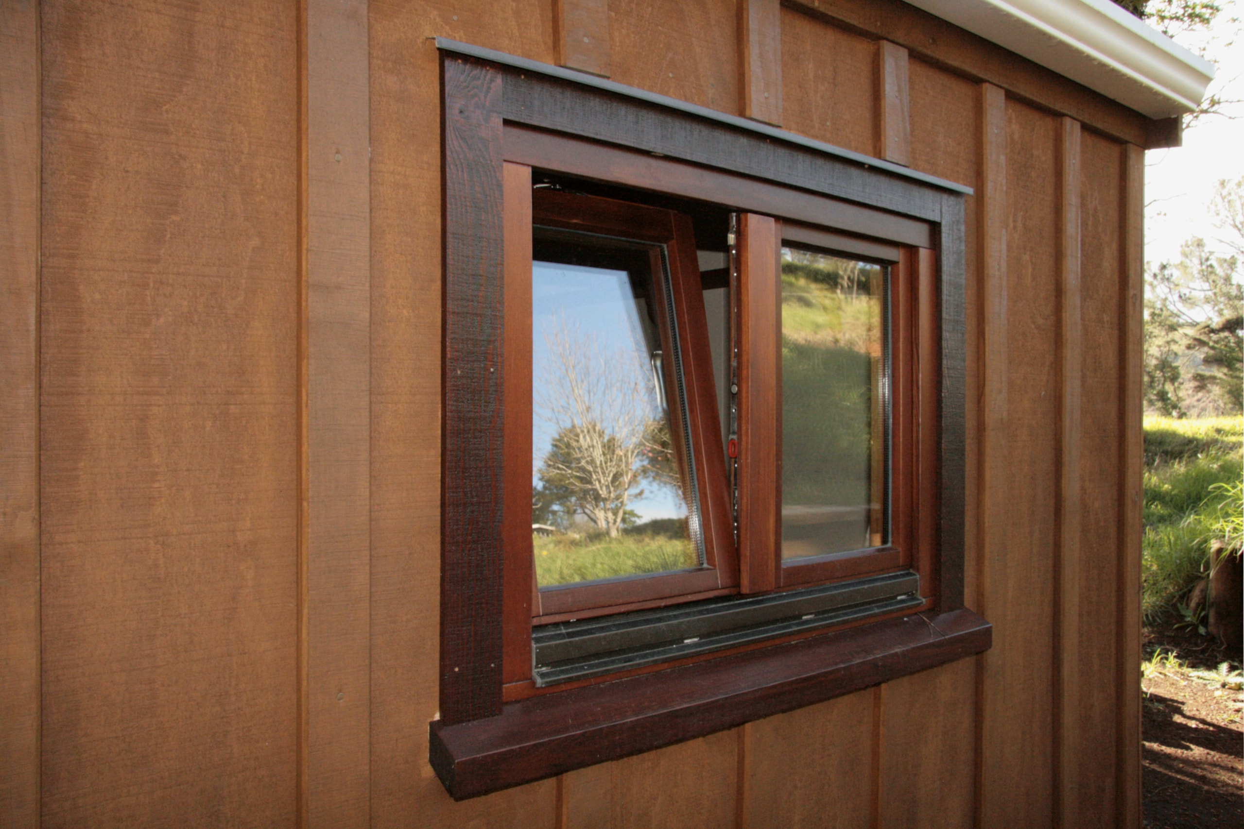 View of windows with wooden frames from Heirloom home, window, wood, wood stain, brown