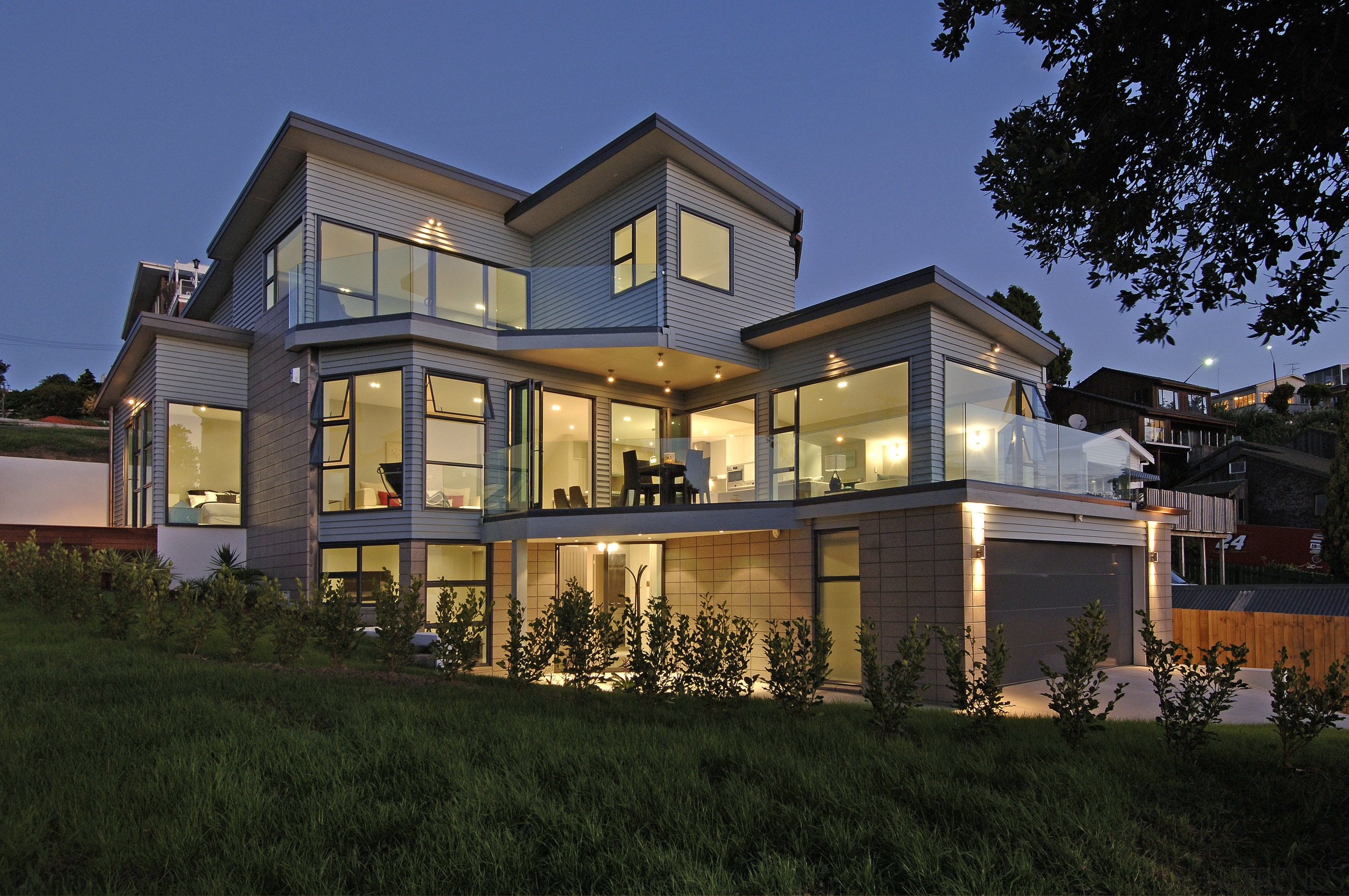 Exterior view of a house where Yellow Fox architecture, building, cottage, elevation, estate, facade, home, house, landscape lighting, lighting, mansion, property, real estate, residential area, roof, siding, villa, window, black