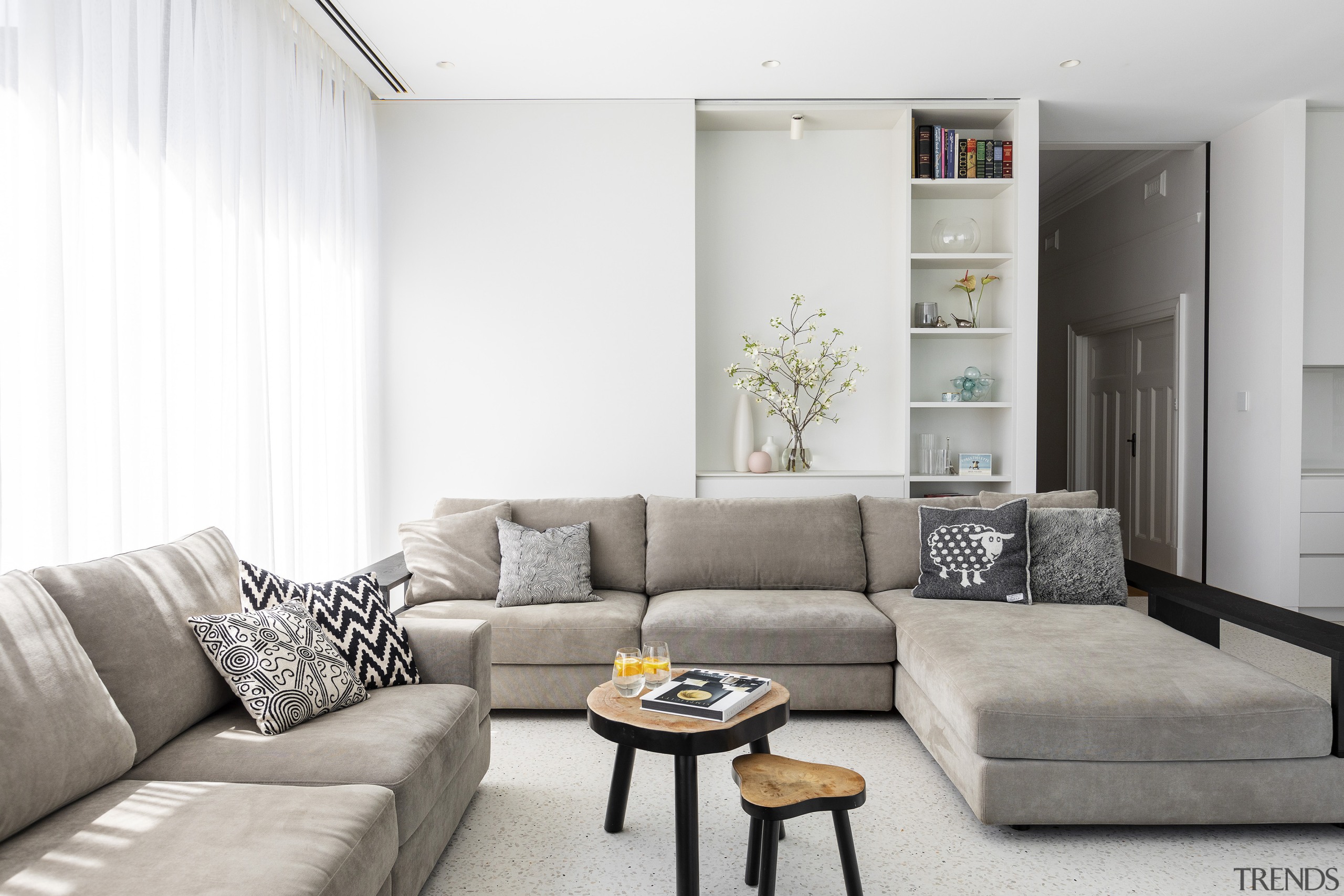 A sliding panel reveals and conceals different storage 