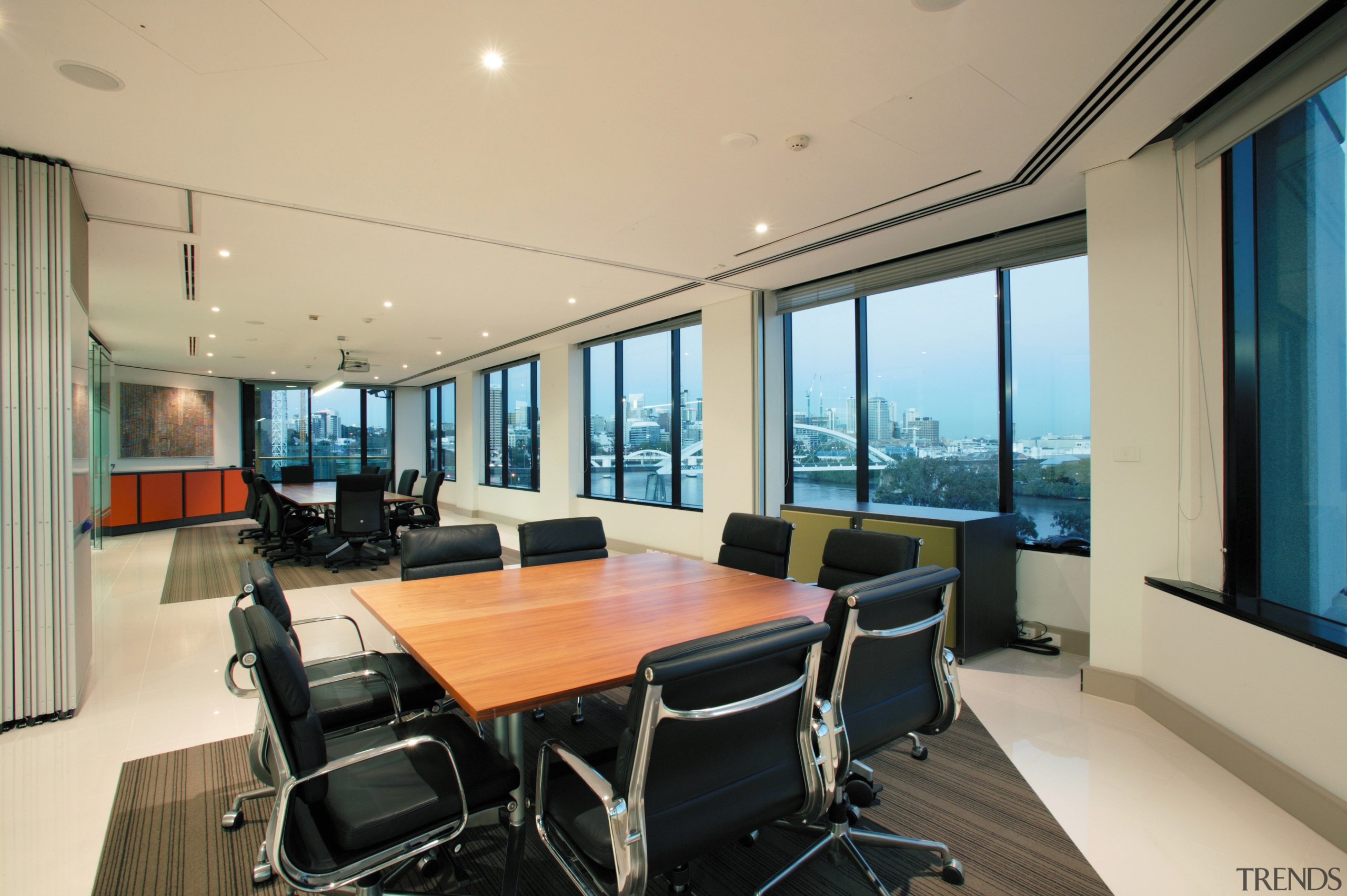 view of the informal office meeting area featuring ceiling, conference hall, interior design, office, penthouse apartment, property, real estate, window, orange