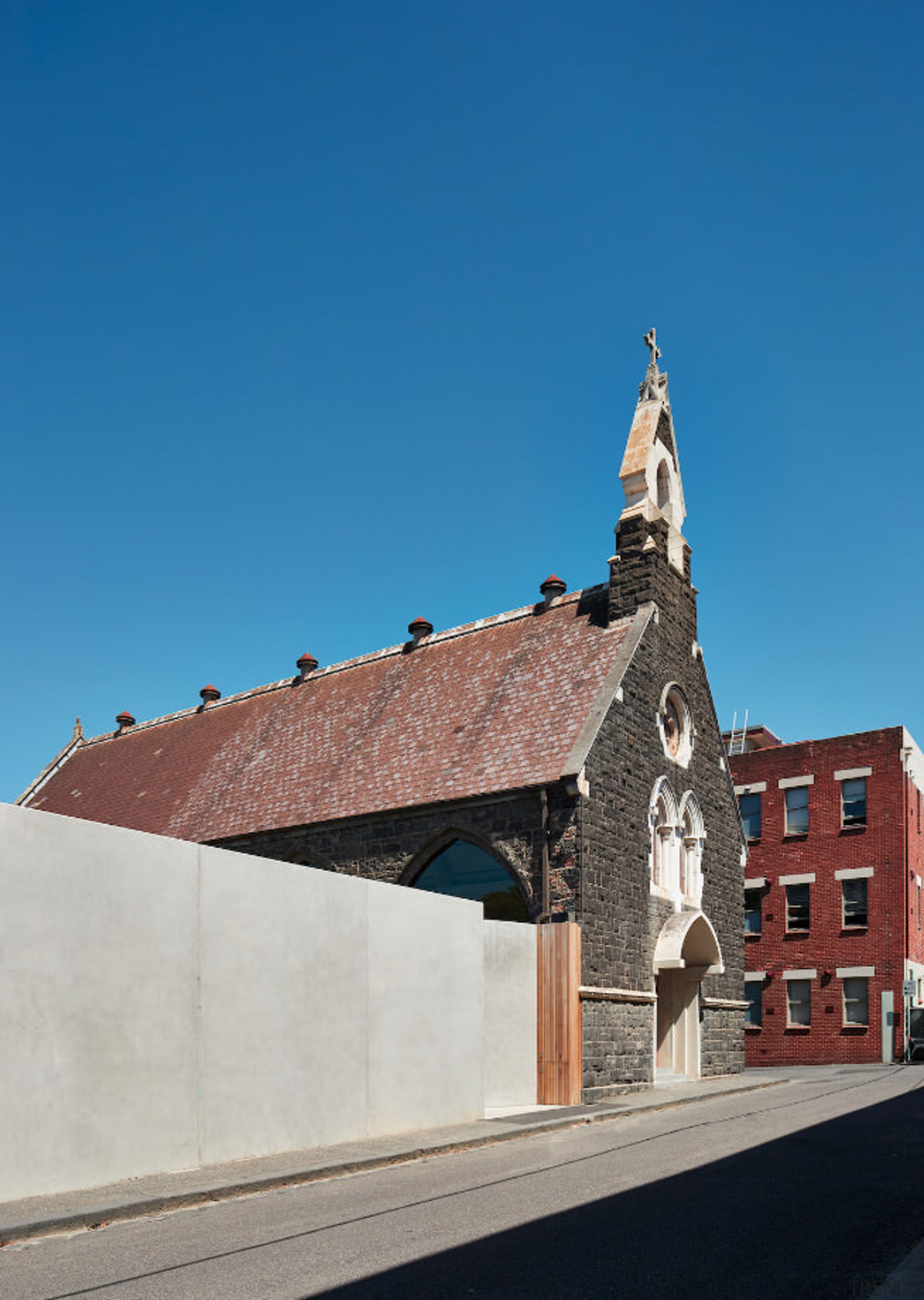 An exterior view - An exterior view - architecture, bell tower, building, church, facade, historic site, house, landmark, place of worship, roof, sky, steeple, wall, gray, blue