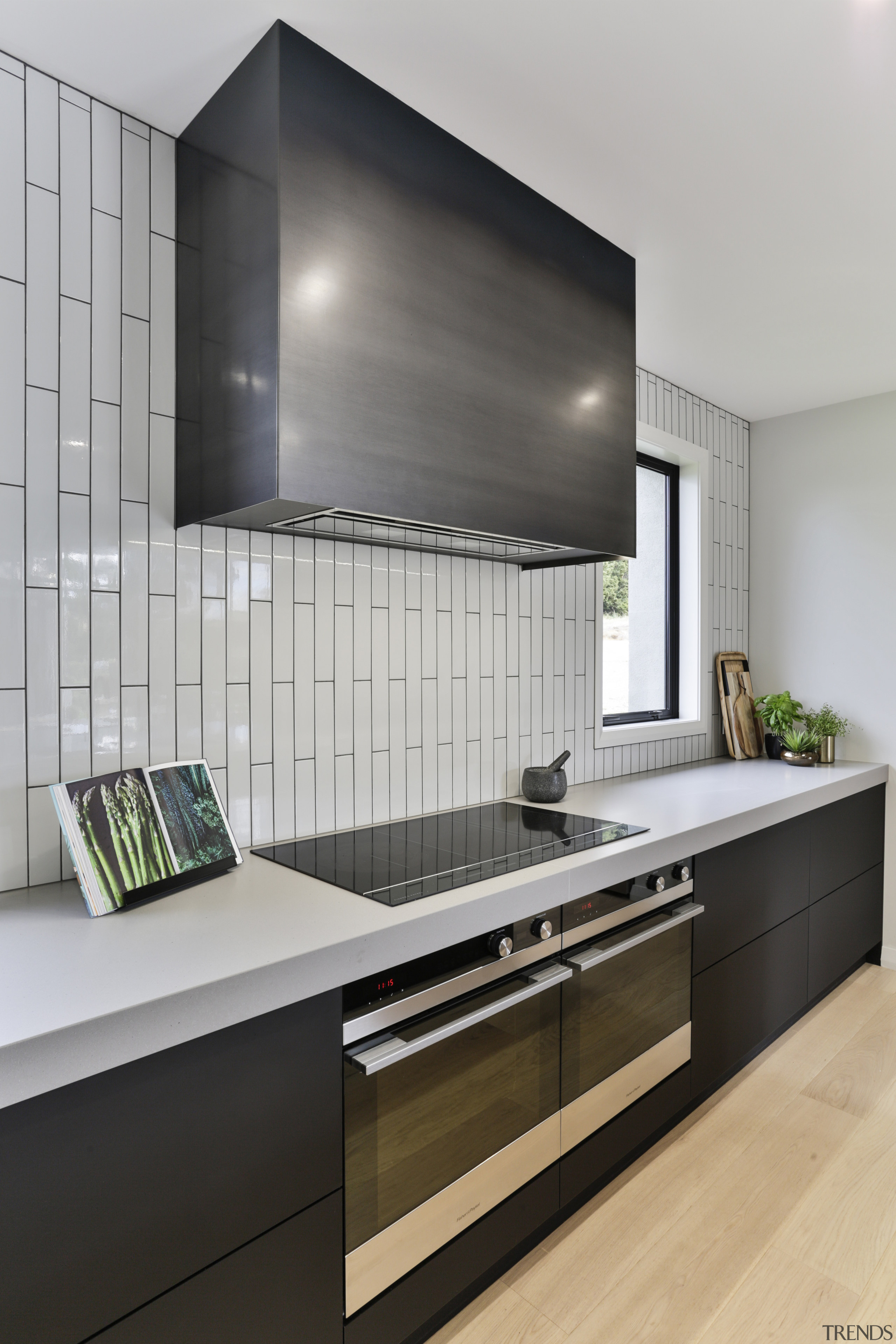 Sometimes the wrapping is as important as what’s cabinetry, kitchen, countertop, cupboard, home, house, interior design, kitchen, kitchen stove, tile, gray, black, industrial, Kyla Potter, Carlielle Kitchens