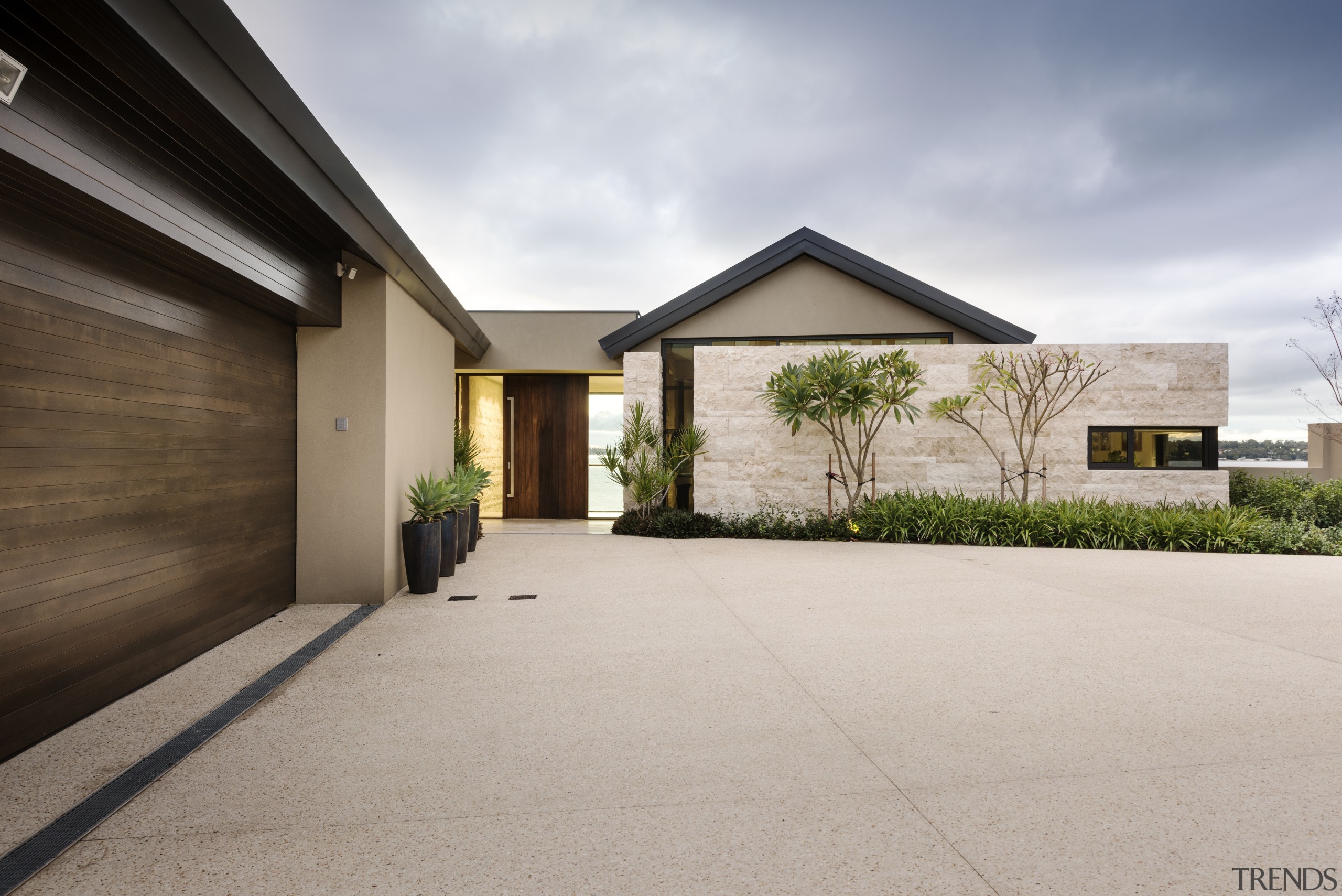 The approach to this home is fairly closed, architecture, building, estate, facade, home, house, property, real estate, residential area, gray