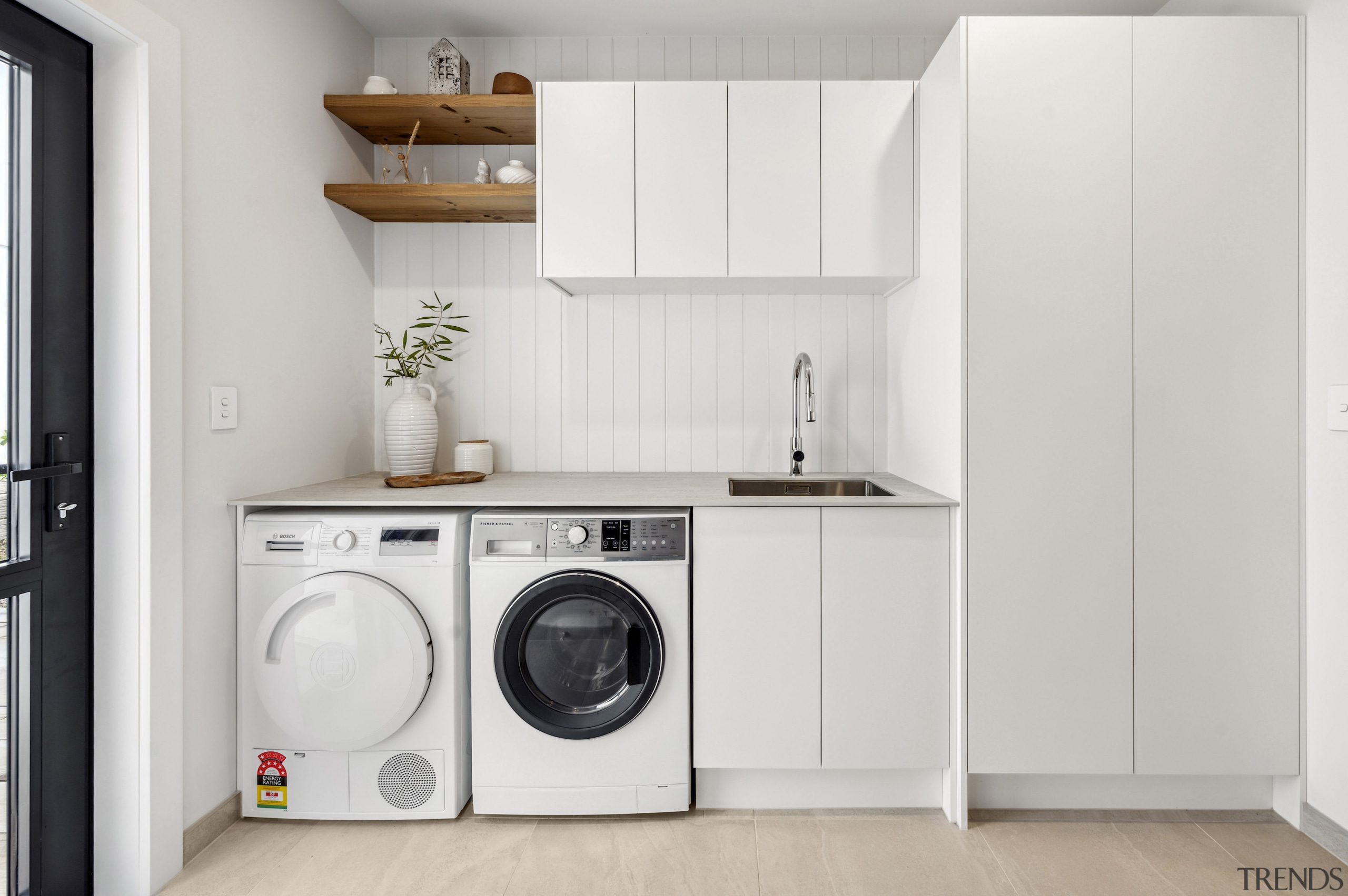 Crisp whites and vertical board finishes add to 