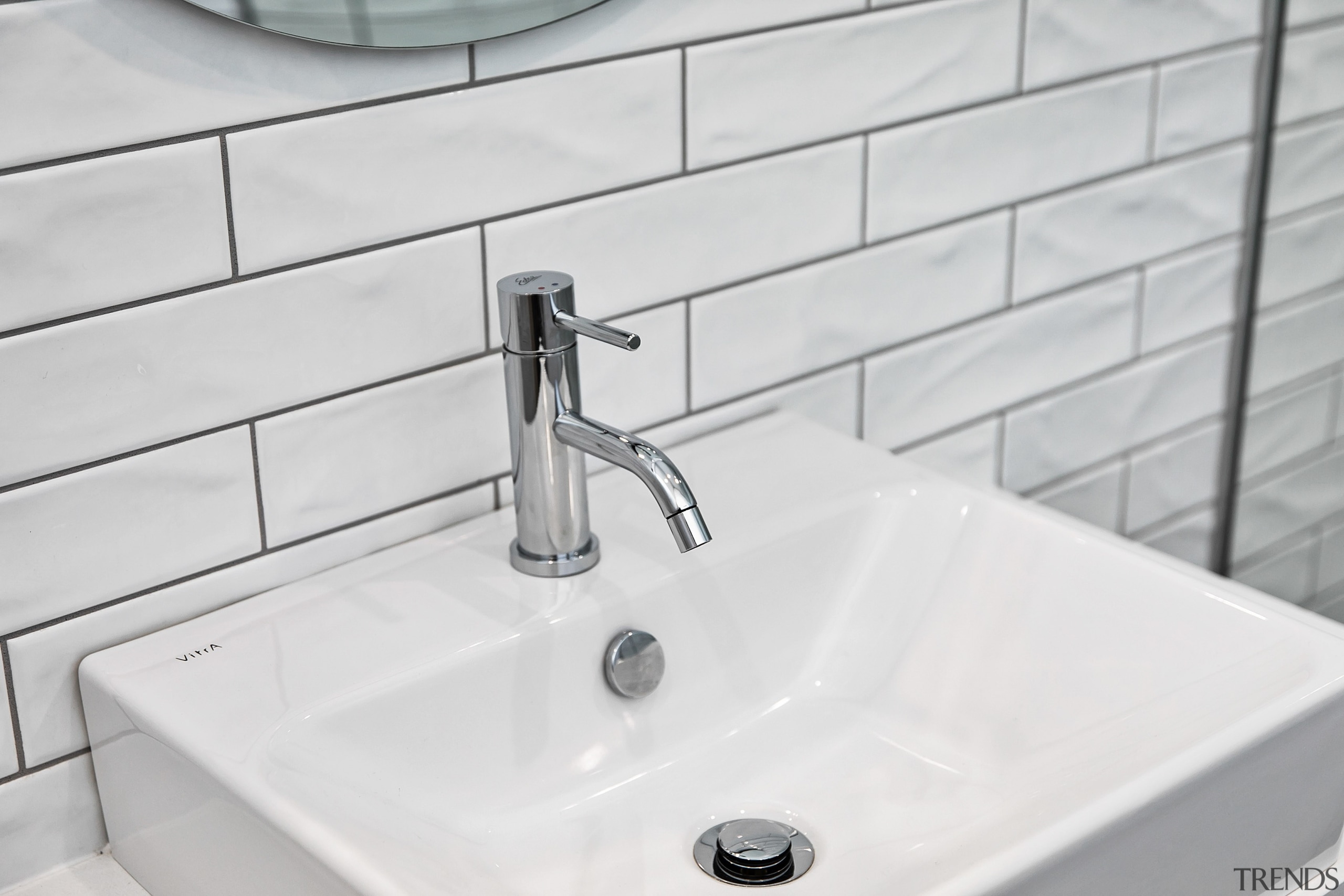 The tiles, basin and tapware all exhude a 