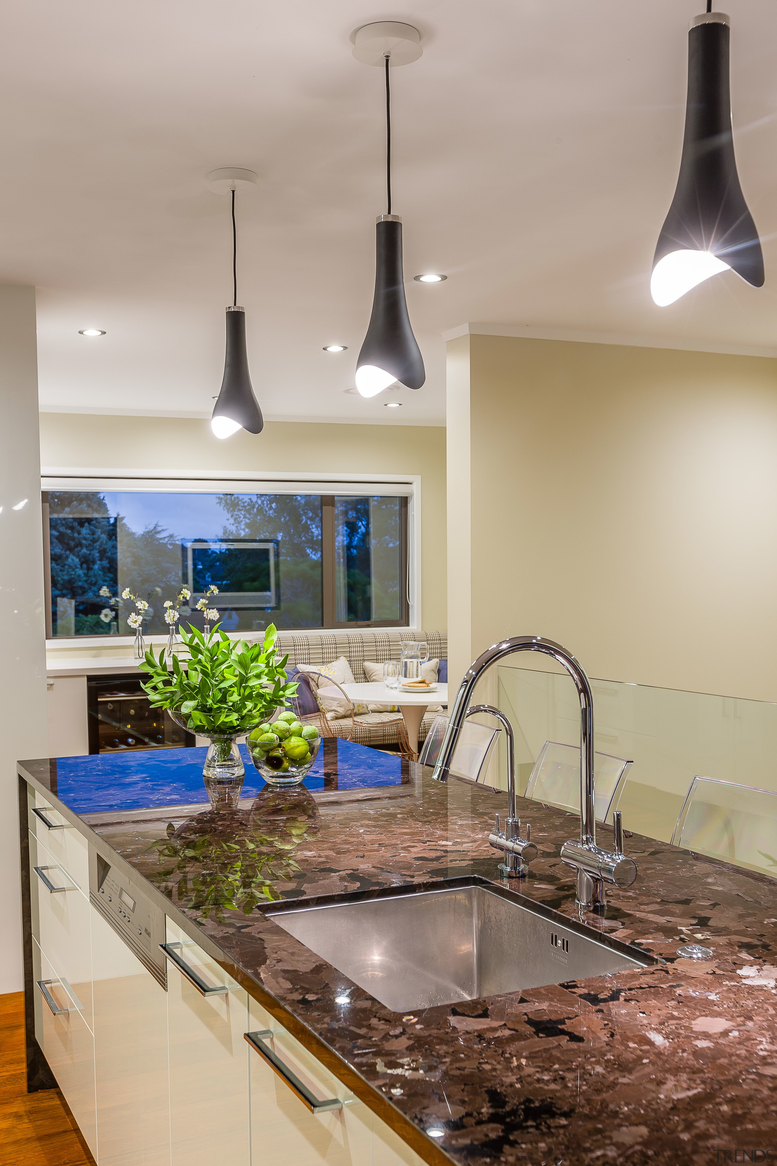 An undermounted stainless steel sink in a brown countertop, home, interior design, kitchen, room, gray