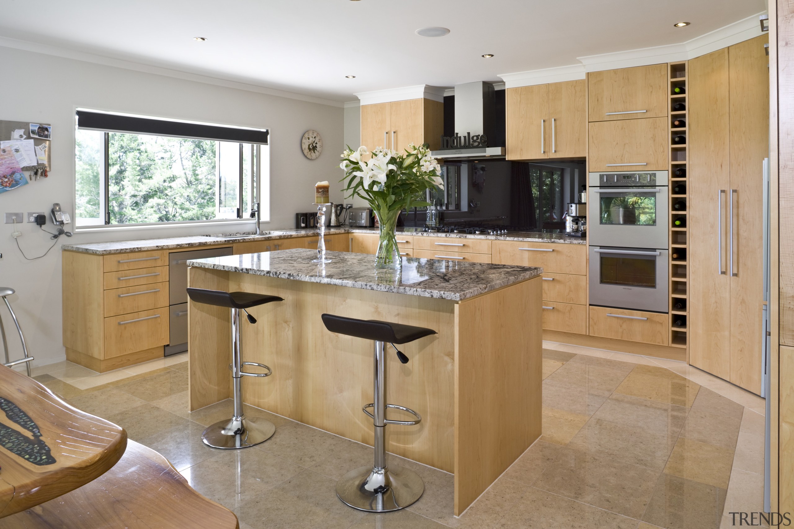 View of a kitchen designed and manufactured by cabinetry, countertop, cuisine classique, floor, flooring, interior design, kitchen, real estate, room, orange, gray