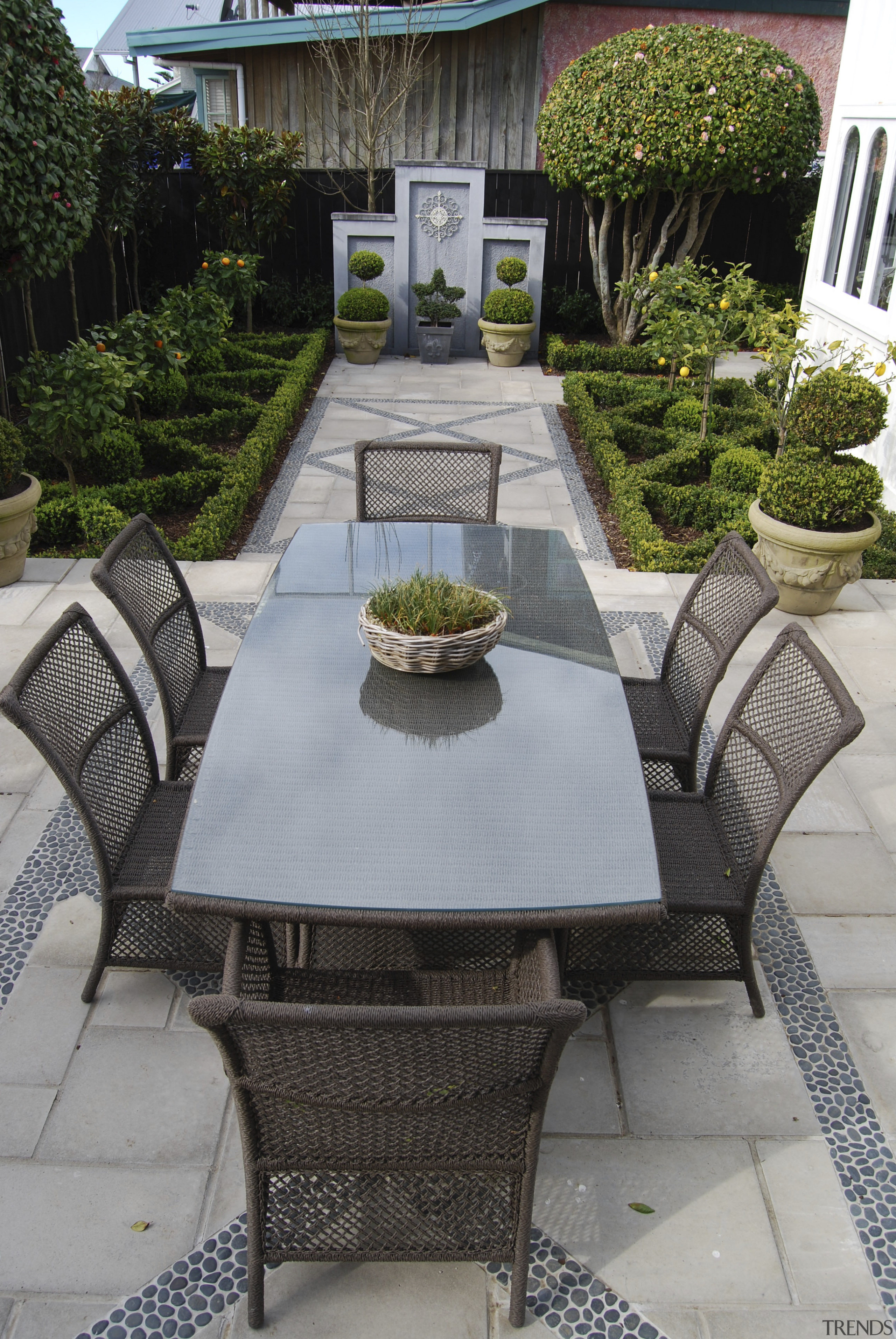 View of formal garden designed by Michael Mansvelt backyard, chair, furniture, outdoor furniture, outdoor structure, patio, sunlounger, table, gray, black