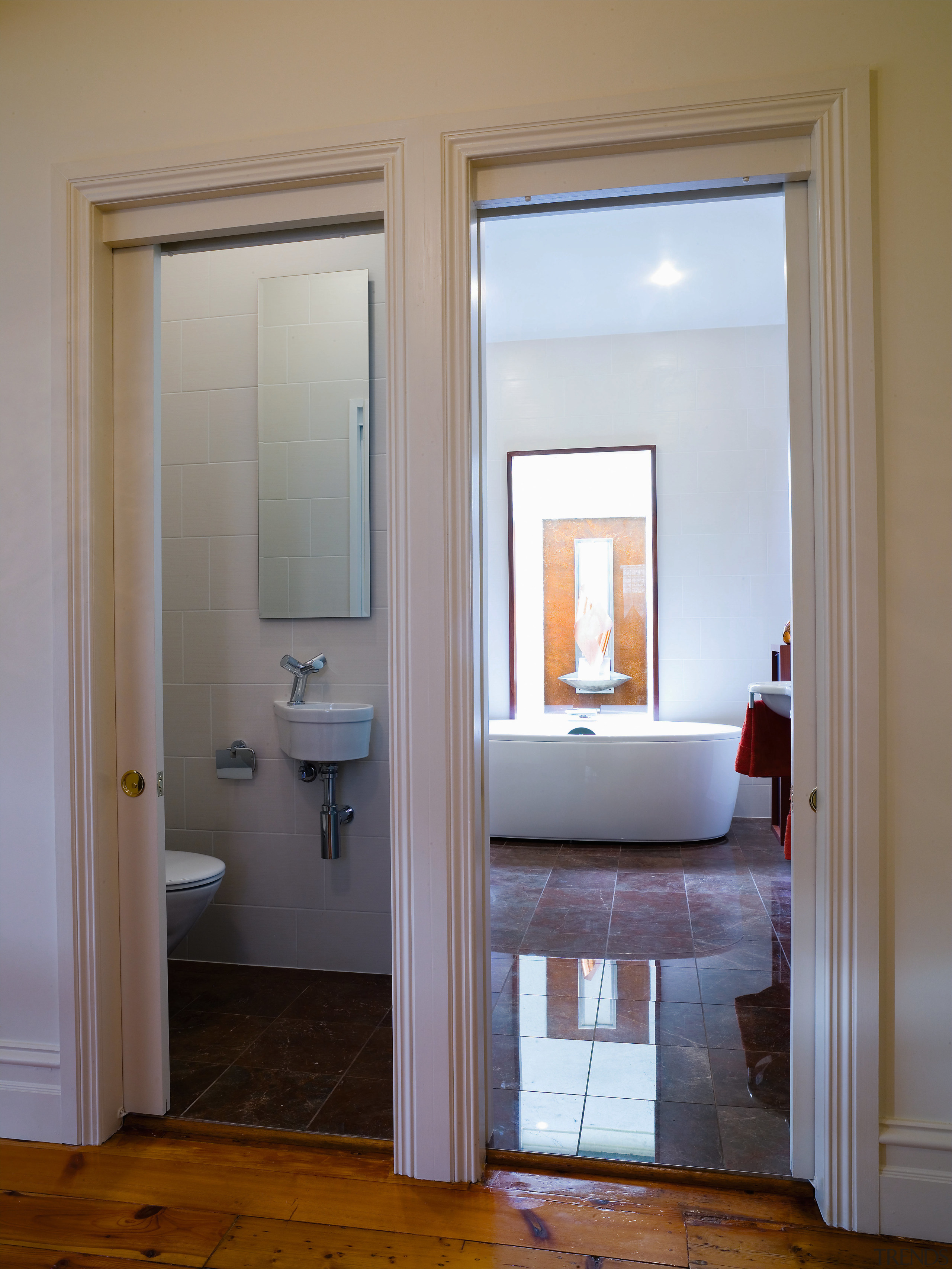 A seperate toilet room now opens from the ceiling, door, floor, flooring, hardwood, home, house, interior design, room, window, wood, gray, brown