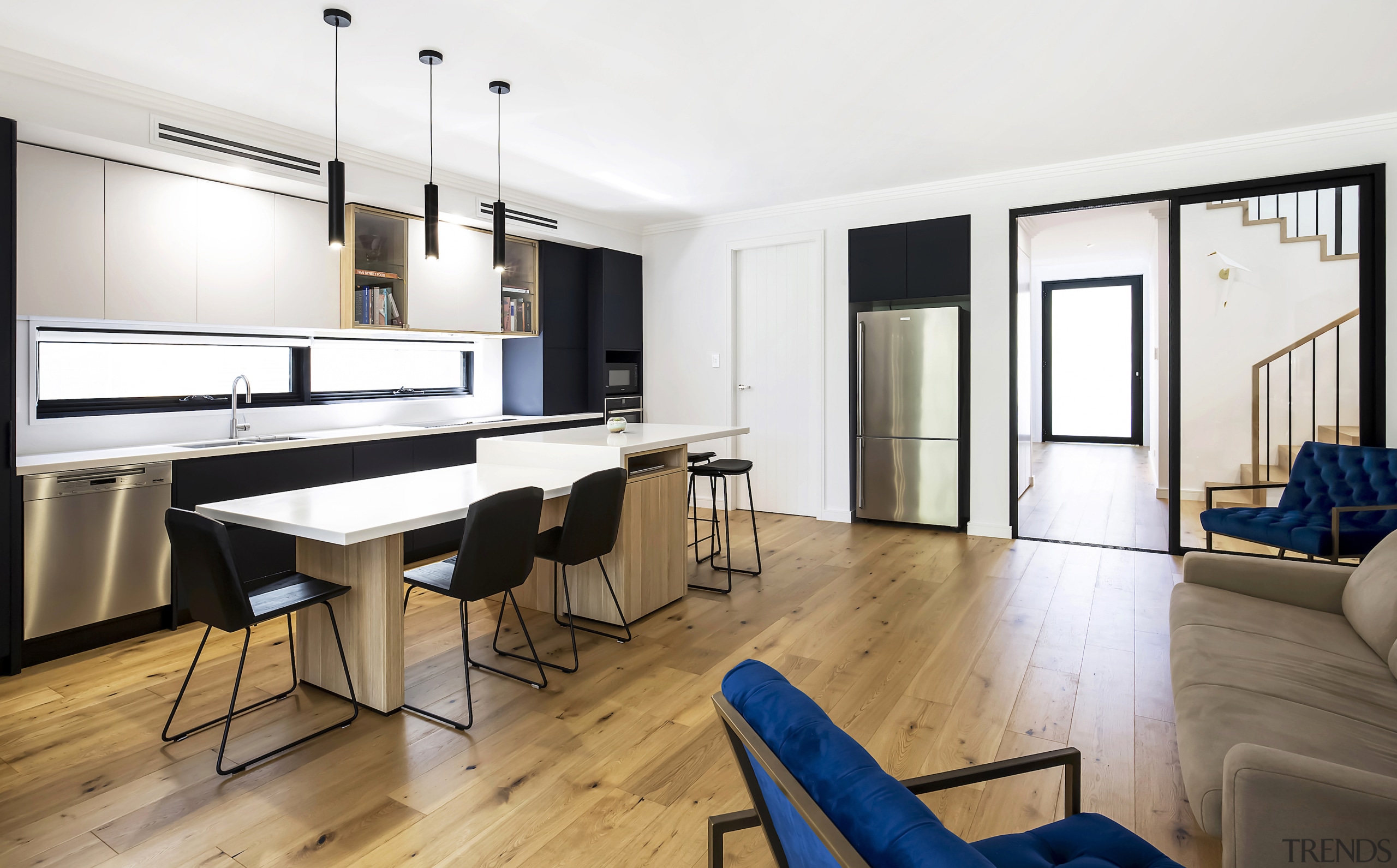 The laundry is in the closed door left 