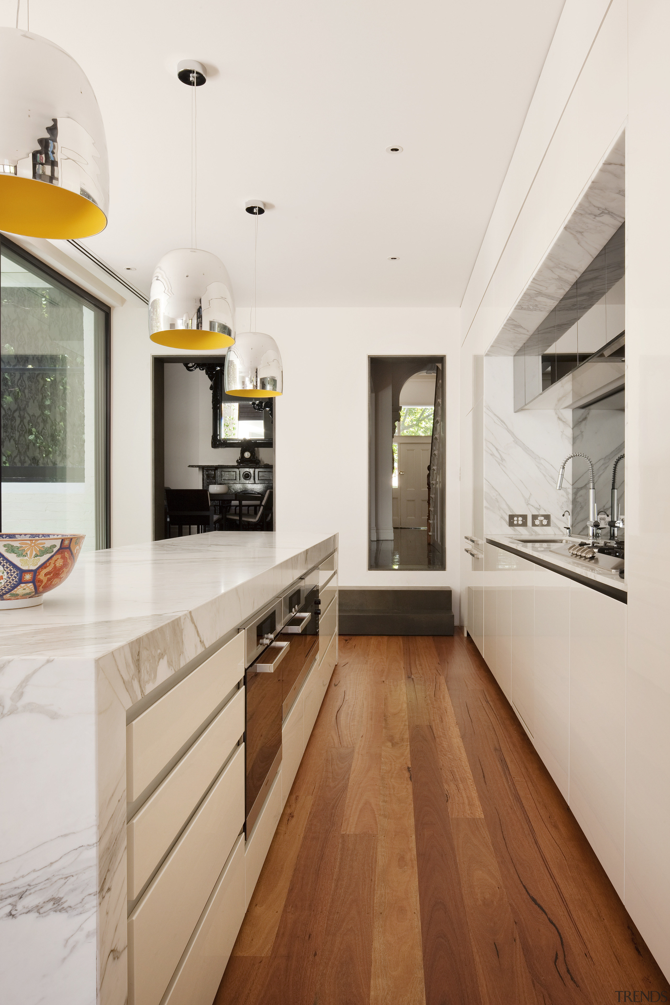 Glazed walls. Wood floors and decking. Island calacatta architecture, ceiling, countertop, floor, flooring, hardwood, house, interior design, kitchen, laminate flooring, wood flooring, white