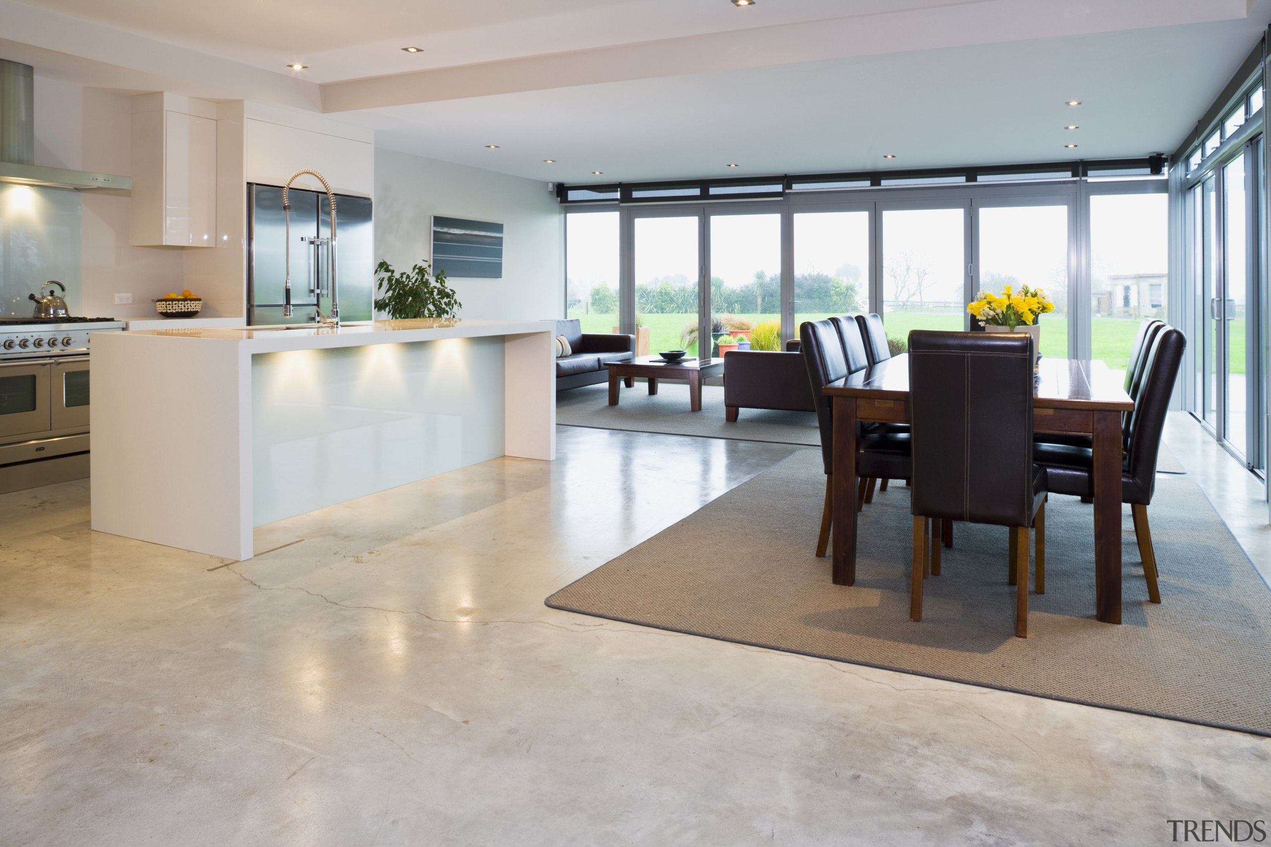 View of a kitchen which features underfloor heating floor, flooring, hardwood, interior design, laminate flooring, property, real estate, wood flooring, gray