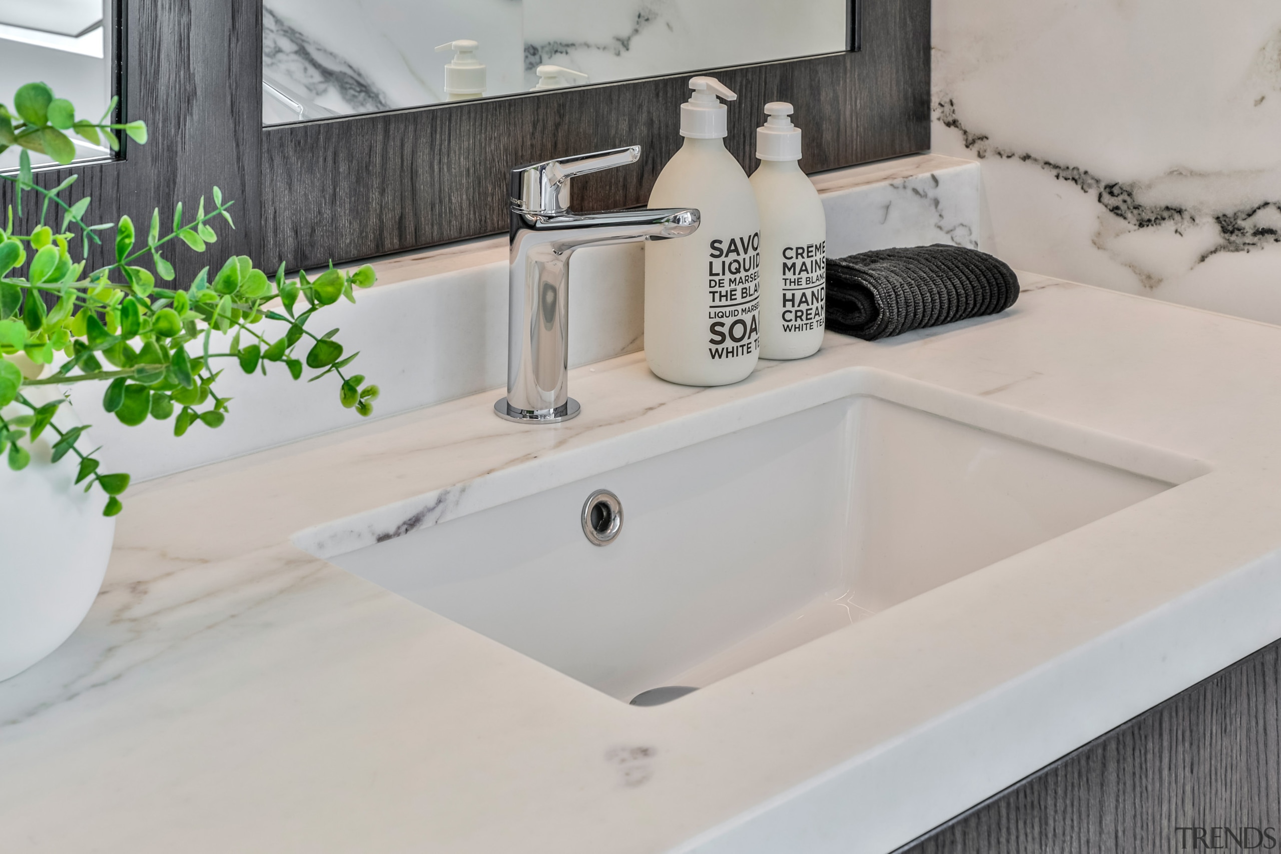 The large wall-to-wall vanity – featuring oak cabinetry 