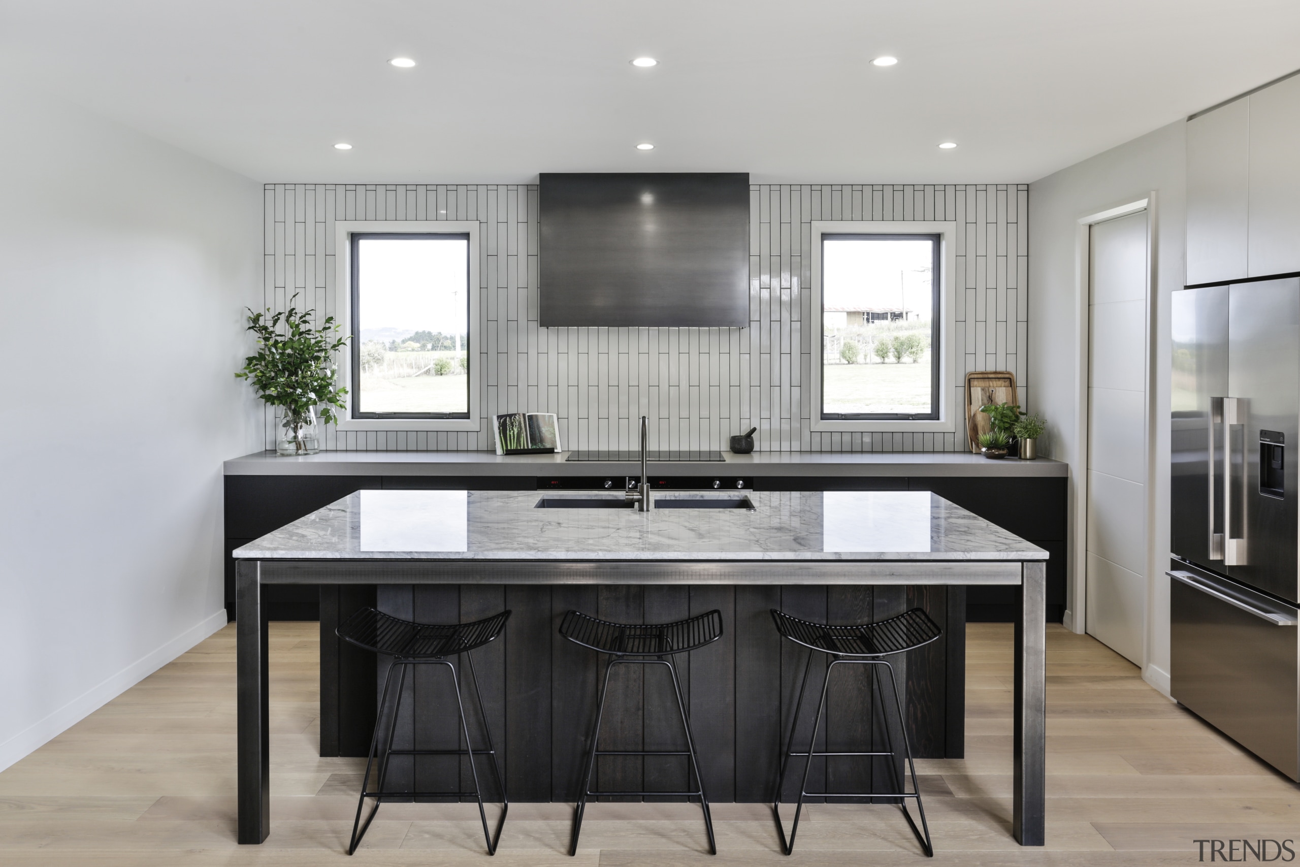 ​​​​​​​Custom steel rangehood meets custom steel island frame architecture, cabinetry, countertop, floor, flooring, furniture, home, house, interior design, kitchen, sink, table, tile.Carlielle Kitchens