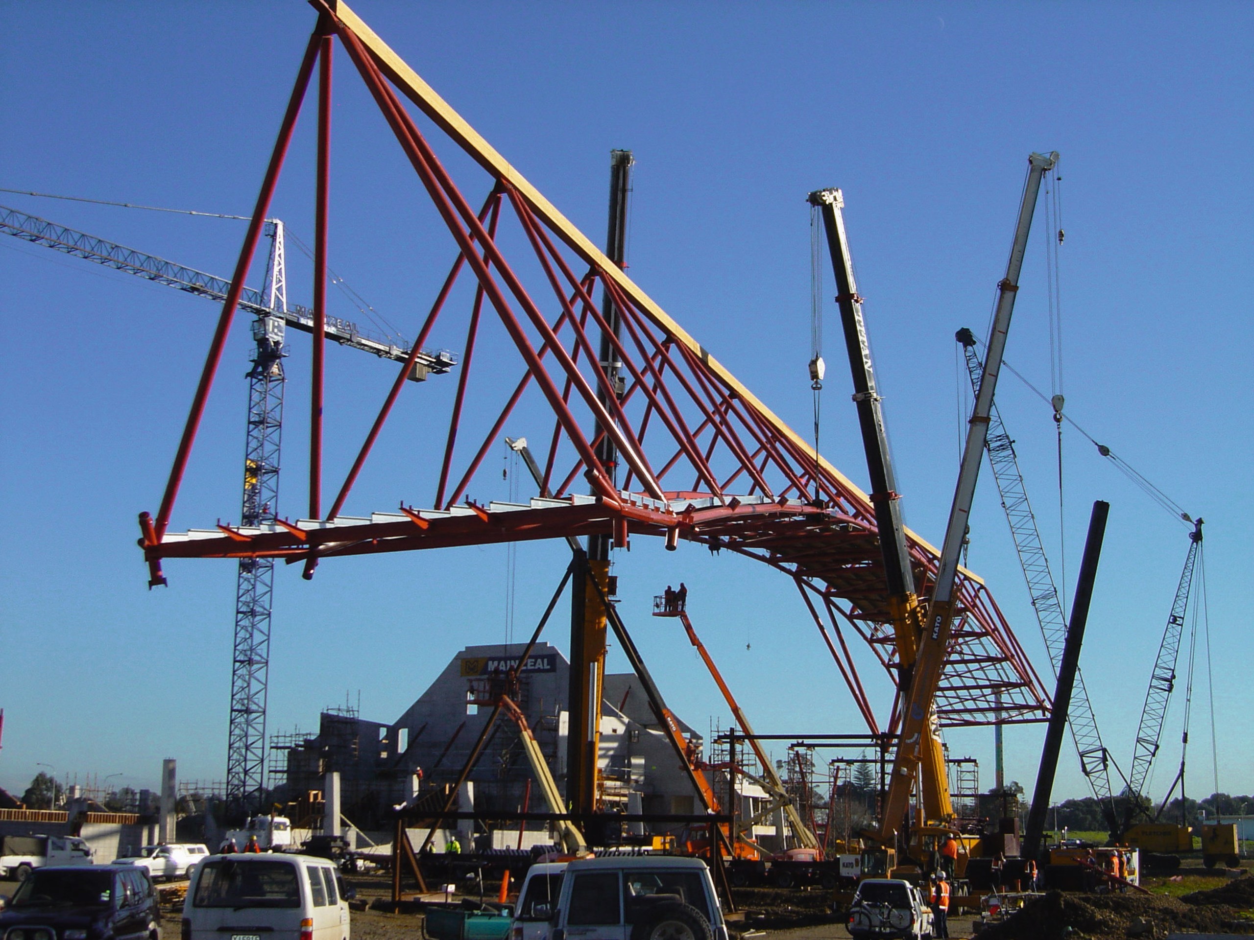 A view of the large building when it bridge, cable stayed bridge, cantilever bridge, construction, construction equipment, crane, extradosed bridge, fixed link, girder bridge, sky, skyway, structure, transporter bridge, truss bridge, blue