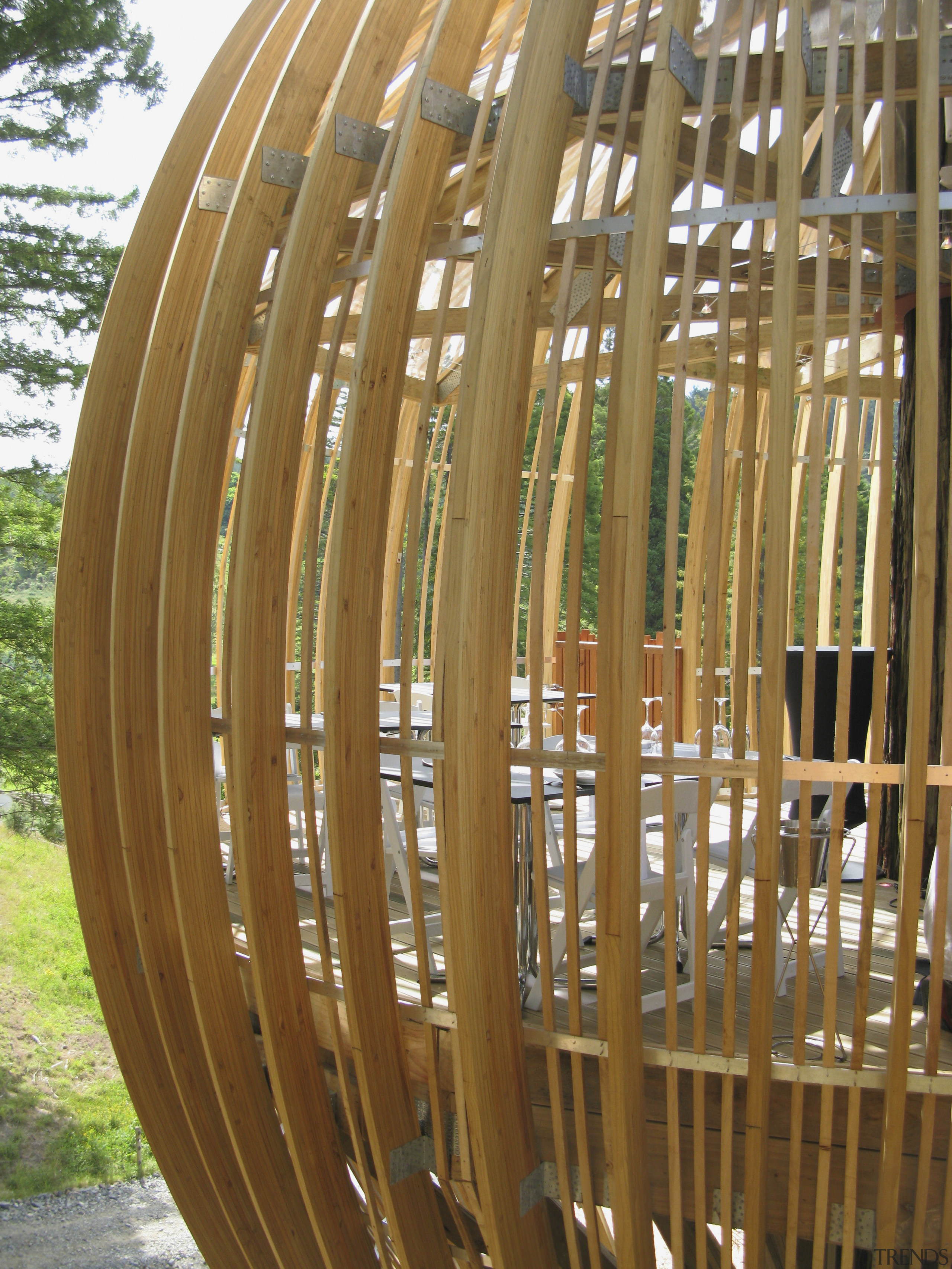 Image of the Yellow Treehouse restaurant which has fence, outdoor structure, wood, brown