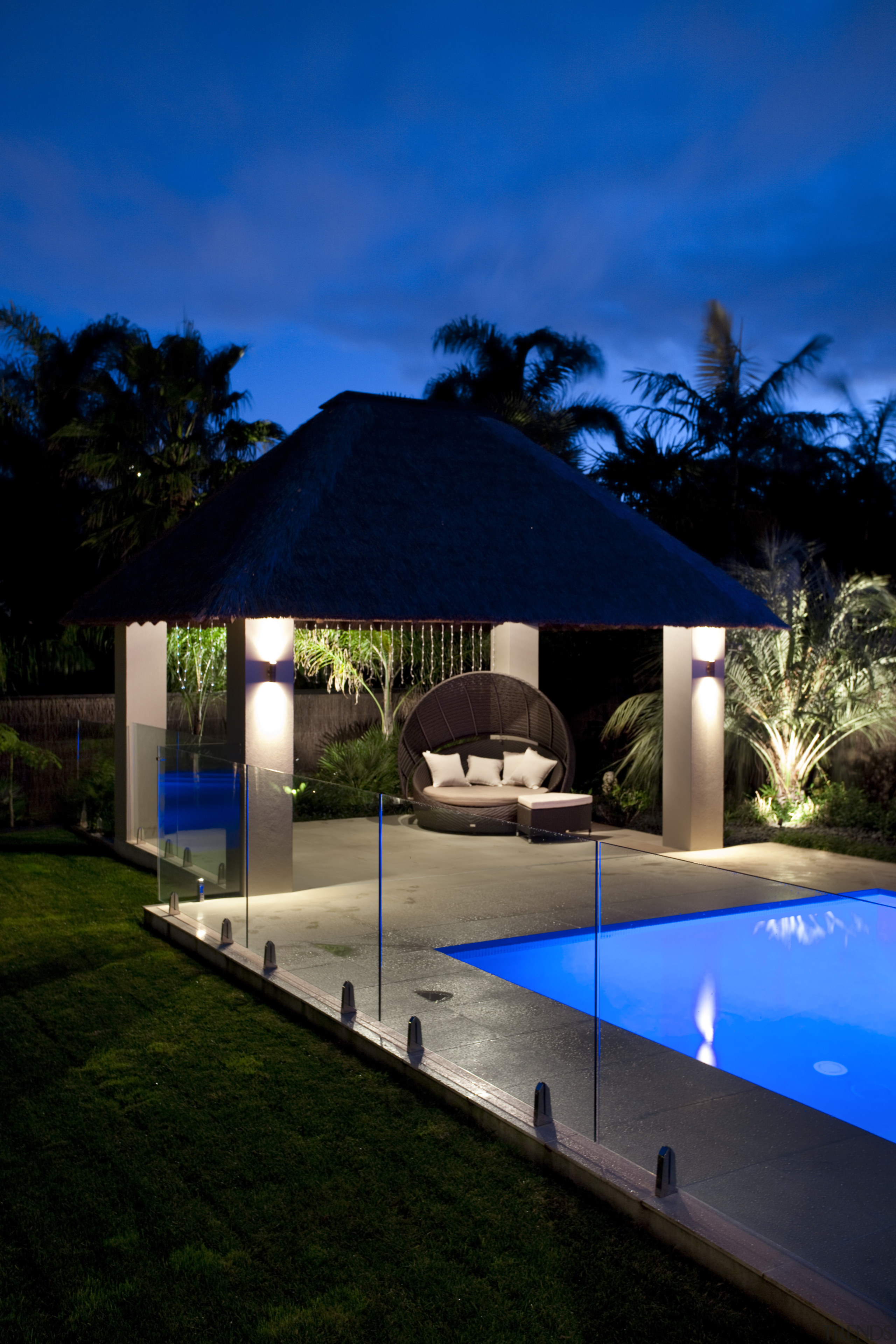 Outdoor night shot of contemporary house and pool architecture, arecales, estate, evening, home, hotel, house, landscape lighting, leisure, lighting, palm tree, property, real estate, reflection, residential area, resort, sky, swimming pool, tropics, villa, water, blue, black