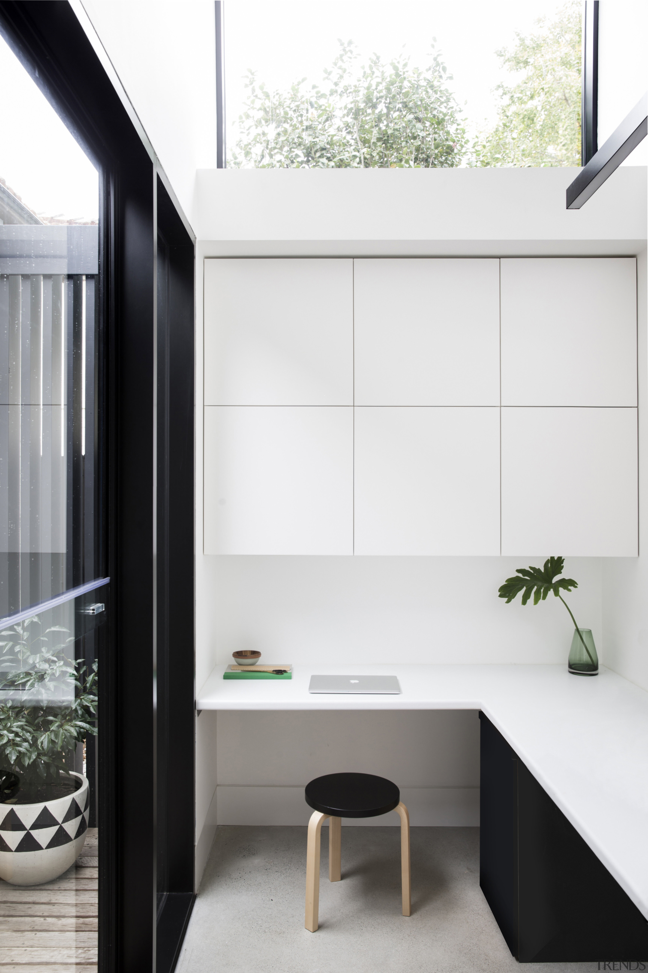 This study space looks out onto a small architecture, furniture, house, interior design, product design, white