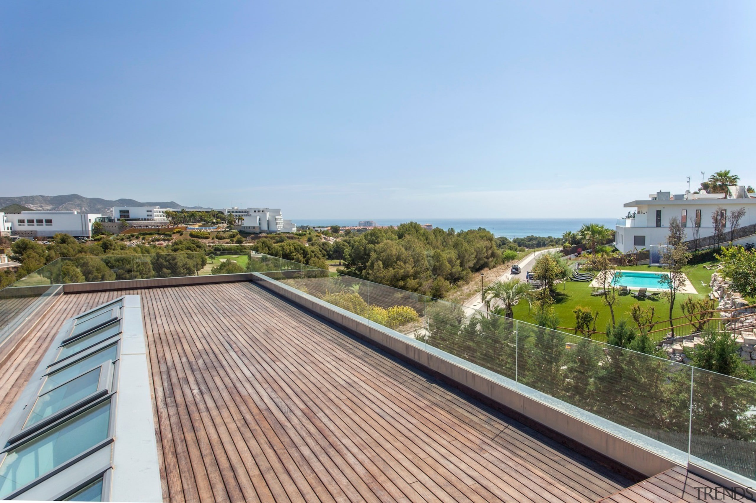 This skylight ensures the interior is always well-lit apartment, condominium, estate, home, house, property, real estate, residential area, resort, roof, sea, villa, teal