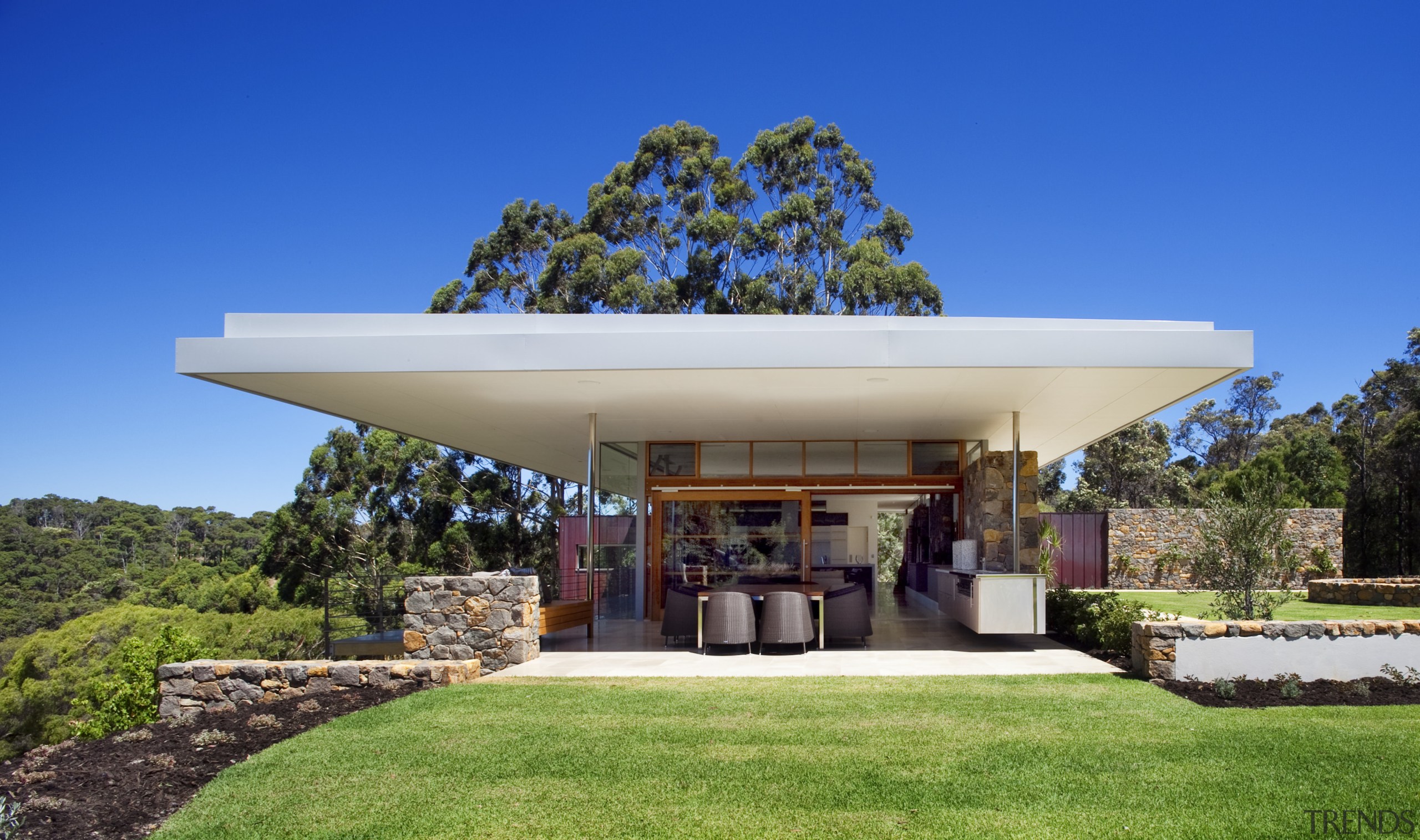 This house was designed by Tim Wright AIA architecture, estate, facade, home, house, outdoor structure, property, real estate, roof, sky, villa, blue