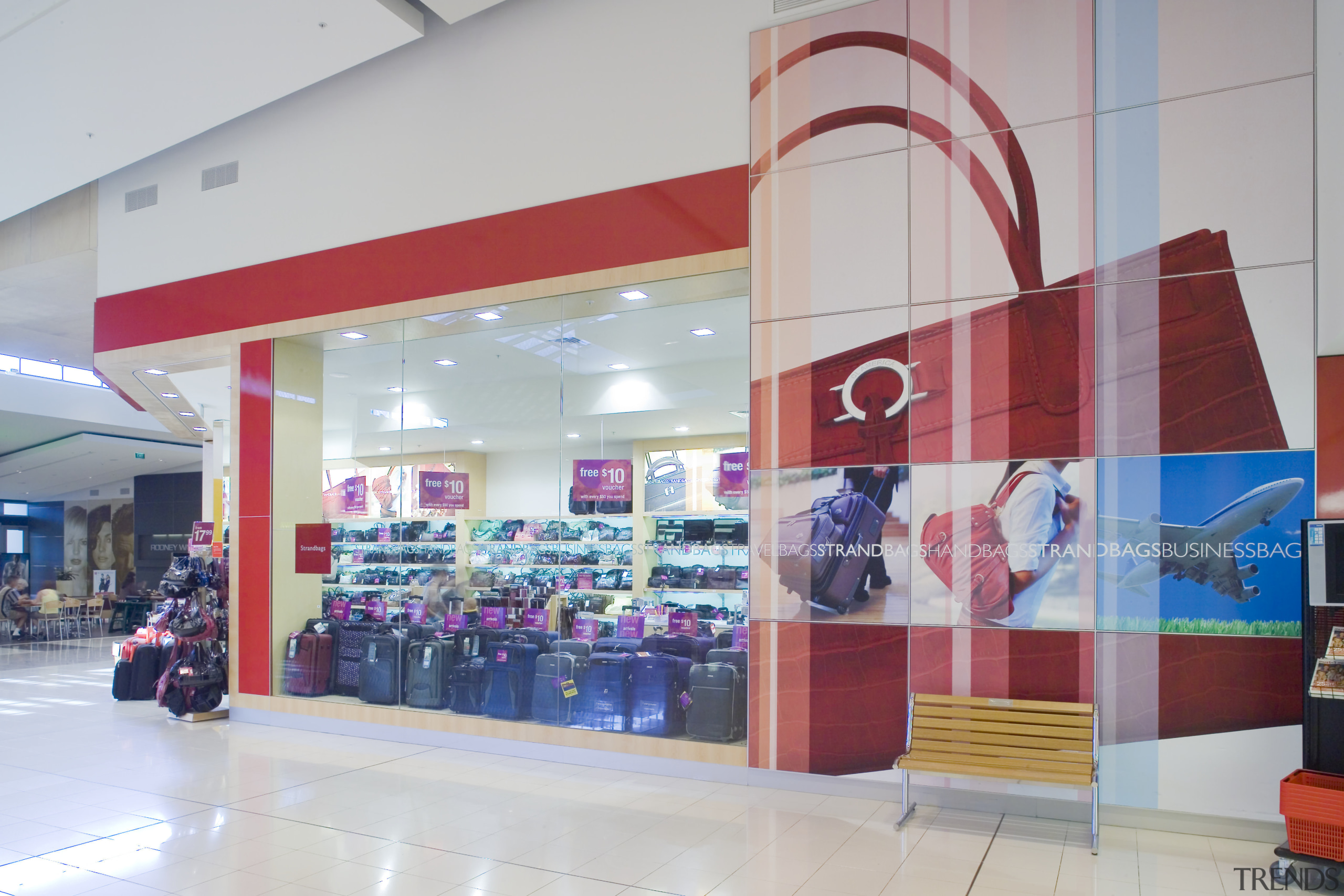 View of retail shop, with red framing around outlet store, product, retail, shopping mall, gray