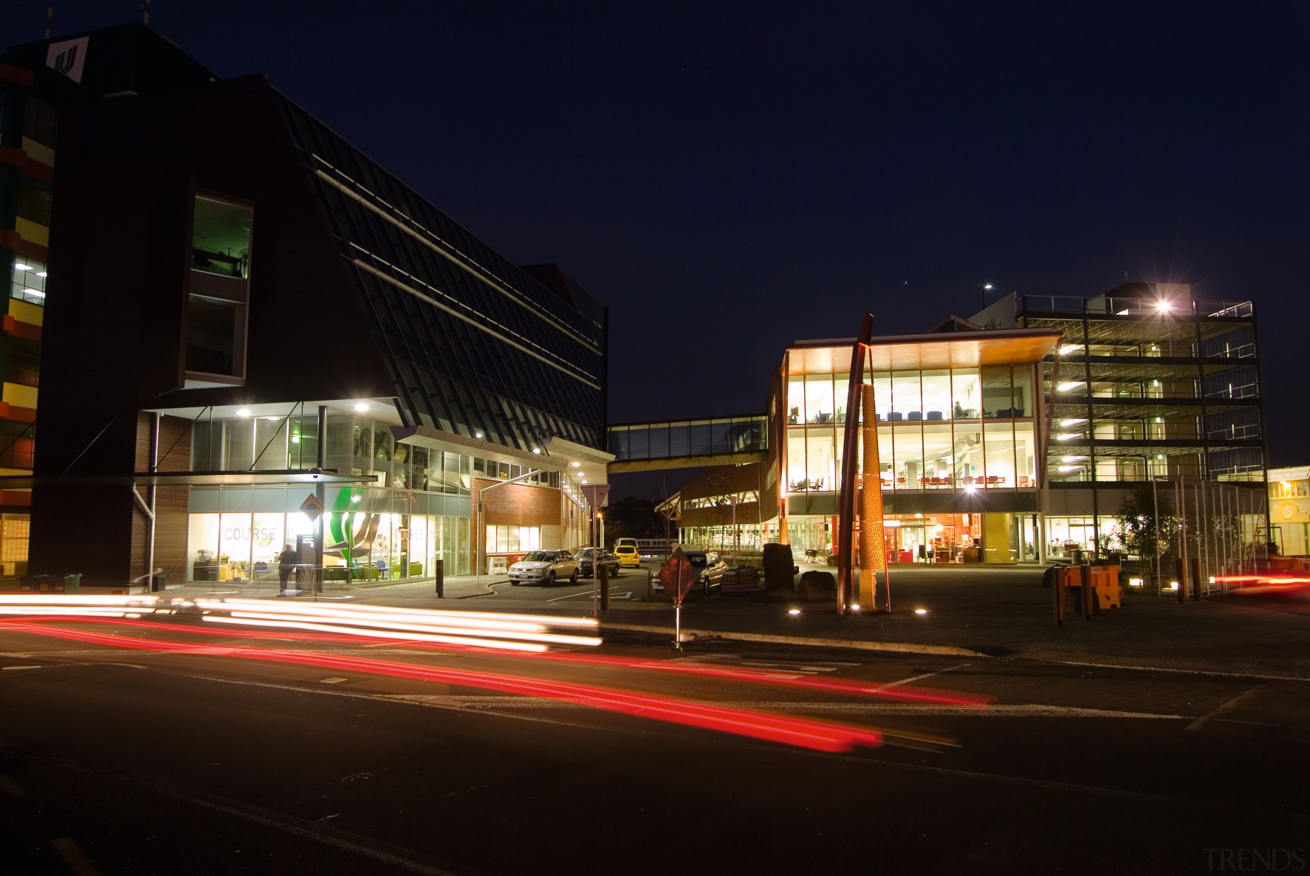 Night view of exterior of Waitakere Central Library architecture, building, car, city, commercial building, condominium, corporate headquarters, downtown, evening, facade, house, light, lighting, metropolis, metropolitan area, mixed use, neighbourhood, night, real estate, reflection, residential area, sky, street, suburb, town, urban area, black, blue