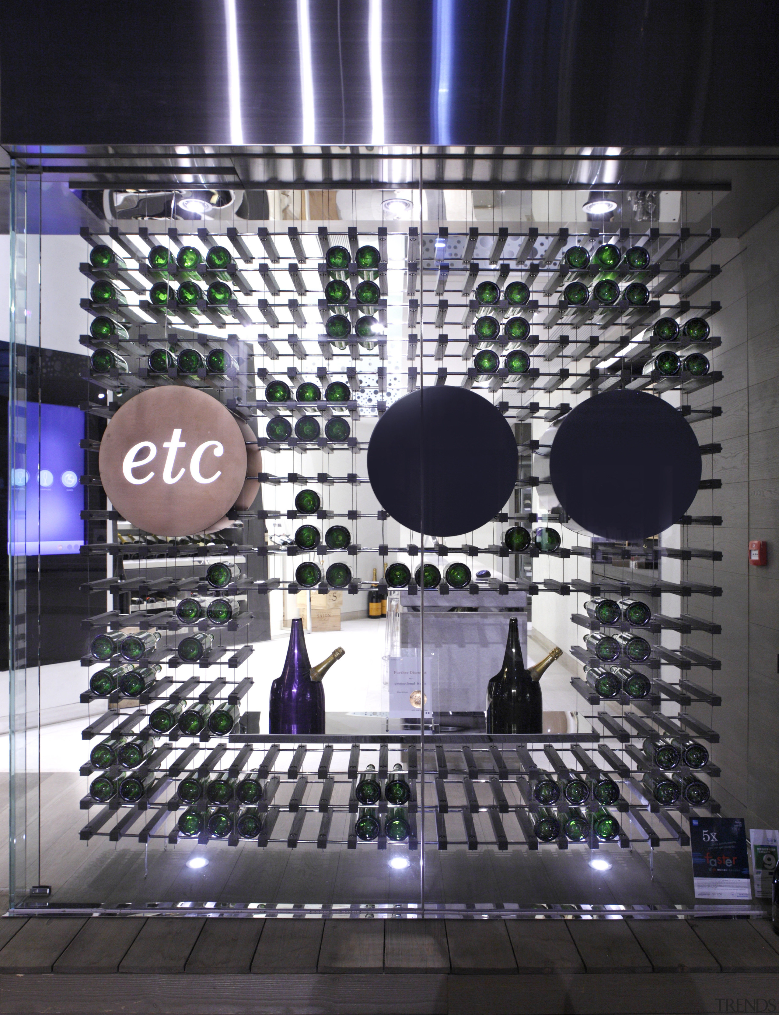 A boutique chain of wine stores in Hong display window, glass, light, lighting, black, gray