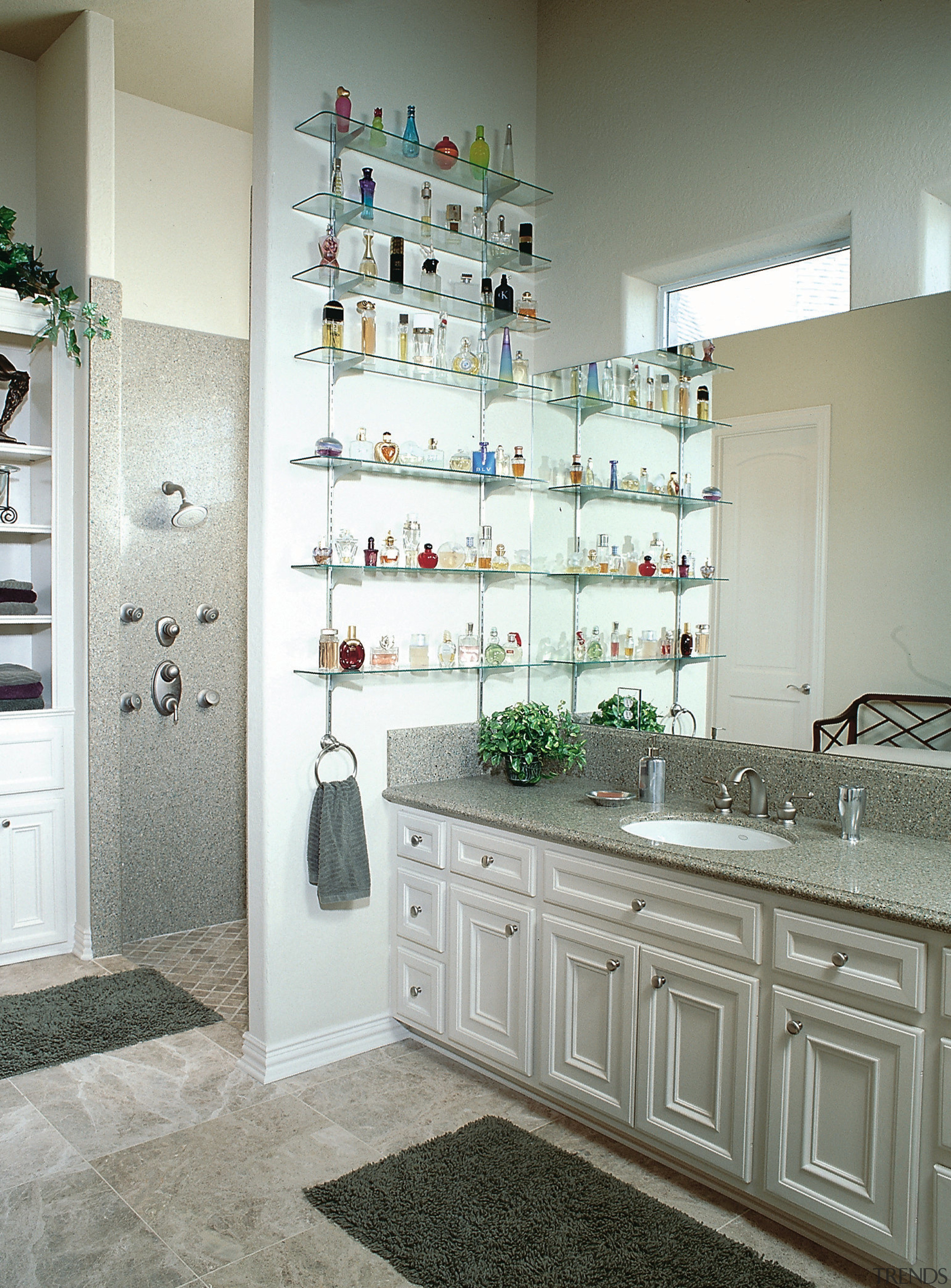 View of this vanity unit within a traditional bathroom, cabinetry, countertop, home, interior design, kitchen, room, shelf, shelving, gray, white