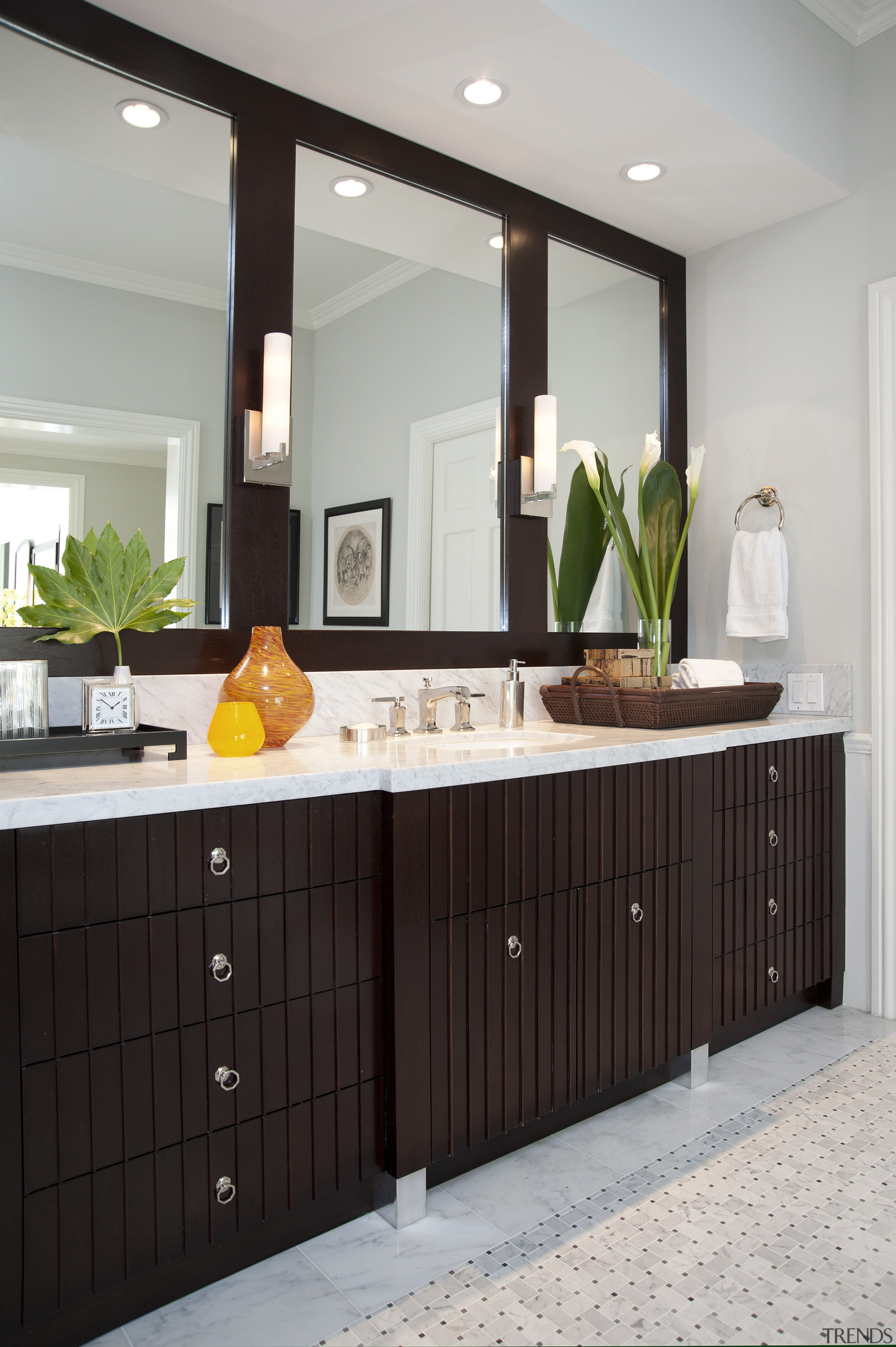 View of brown cabinetry with three rectangular mirrors. bathroom, bathroom accessory, bathroom cabinet, cabinetry, countertop, home, interior design, kitchen, room, sink, gray, black